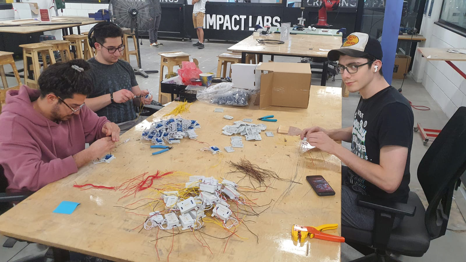 Assembling motion-activated soap displays for Sabon, a luxury soap brand.