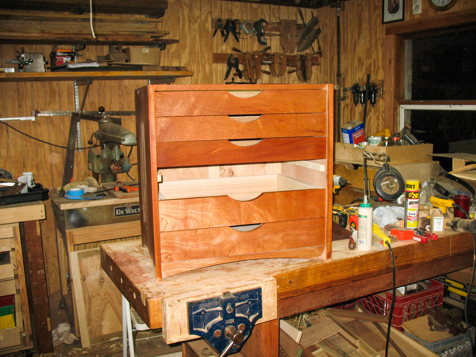 After raising the grain with a damp rag, note the difference in grain (and color) on the drawer fronts