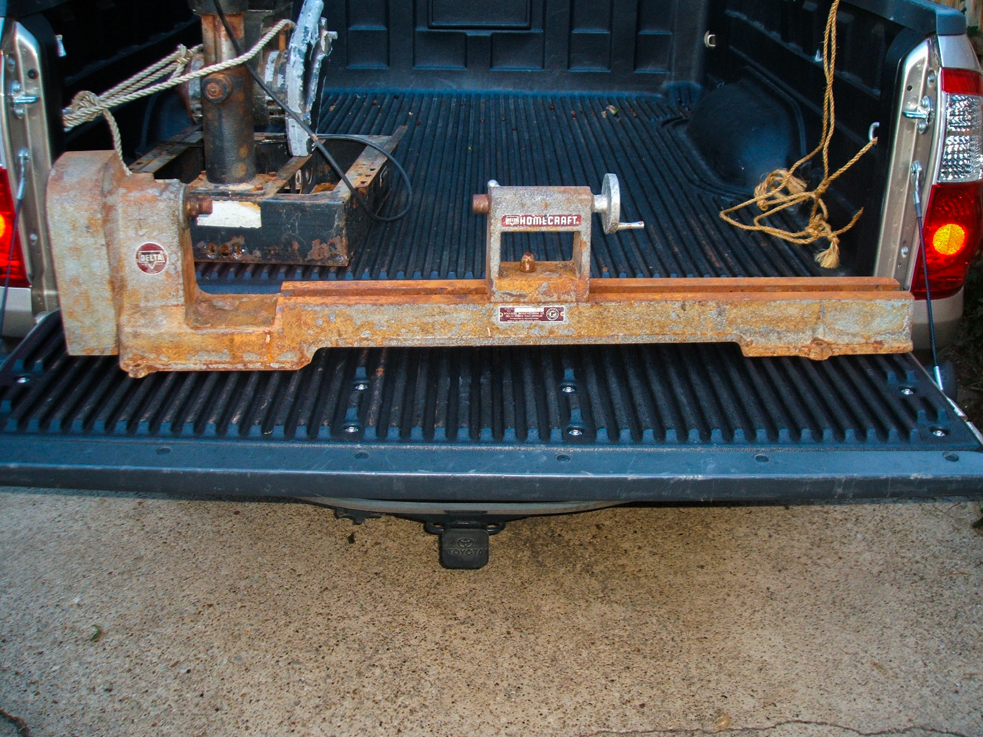 The lathe when it arrived home at my shop. It was missing a lot of parts that would take me a while to find.