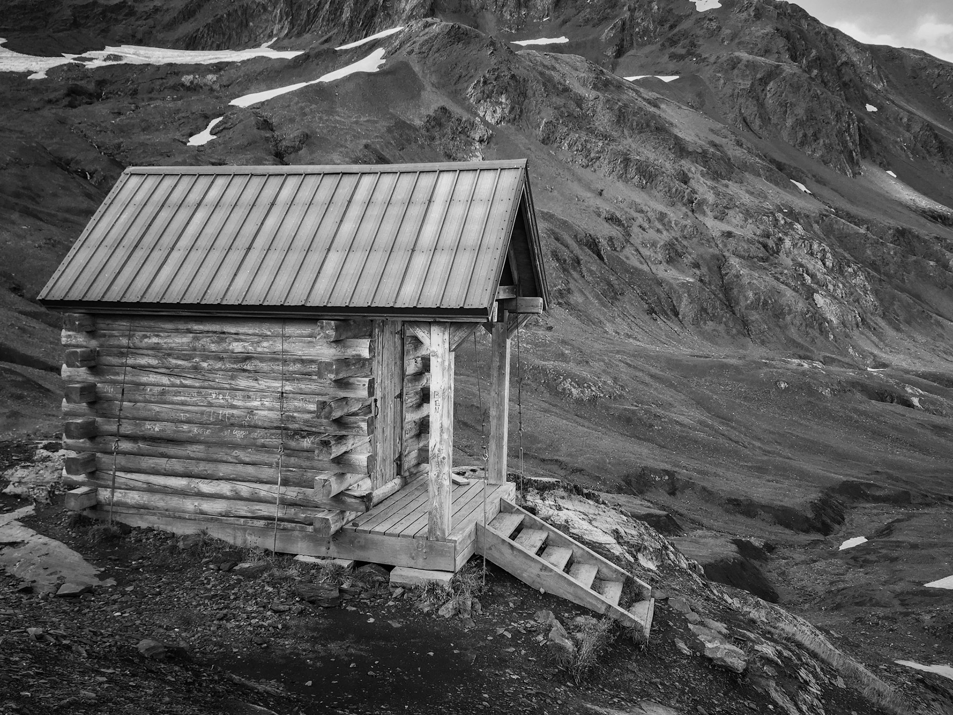 Small shelter atop Harding Ice Field. Many words were carved into it, but one humerous statement was - the cake is a lie.