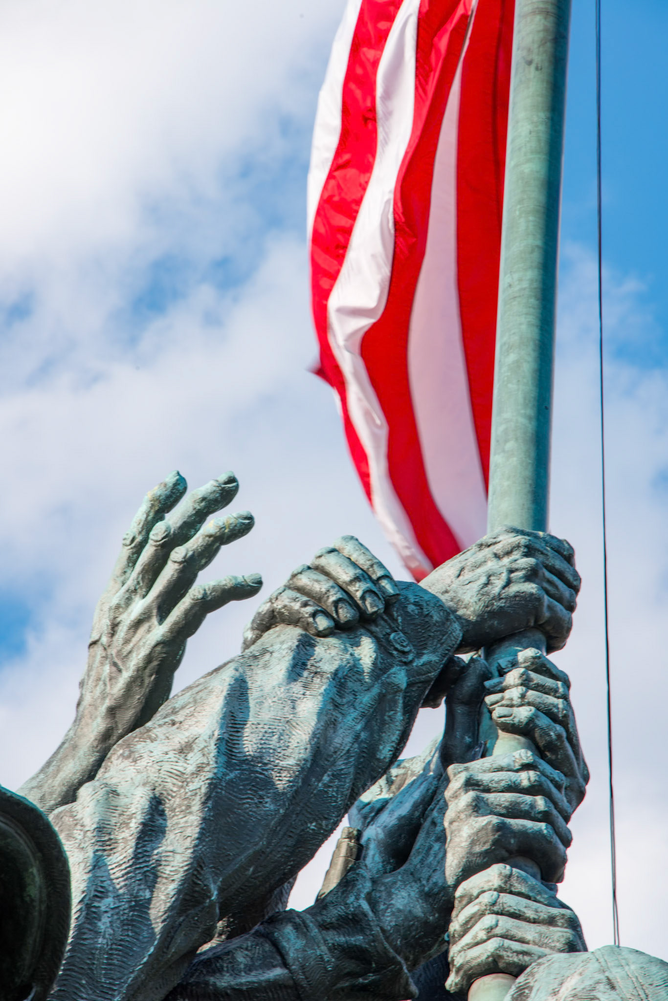 Iwo Jima Hands Holding Flag