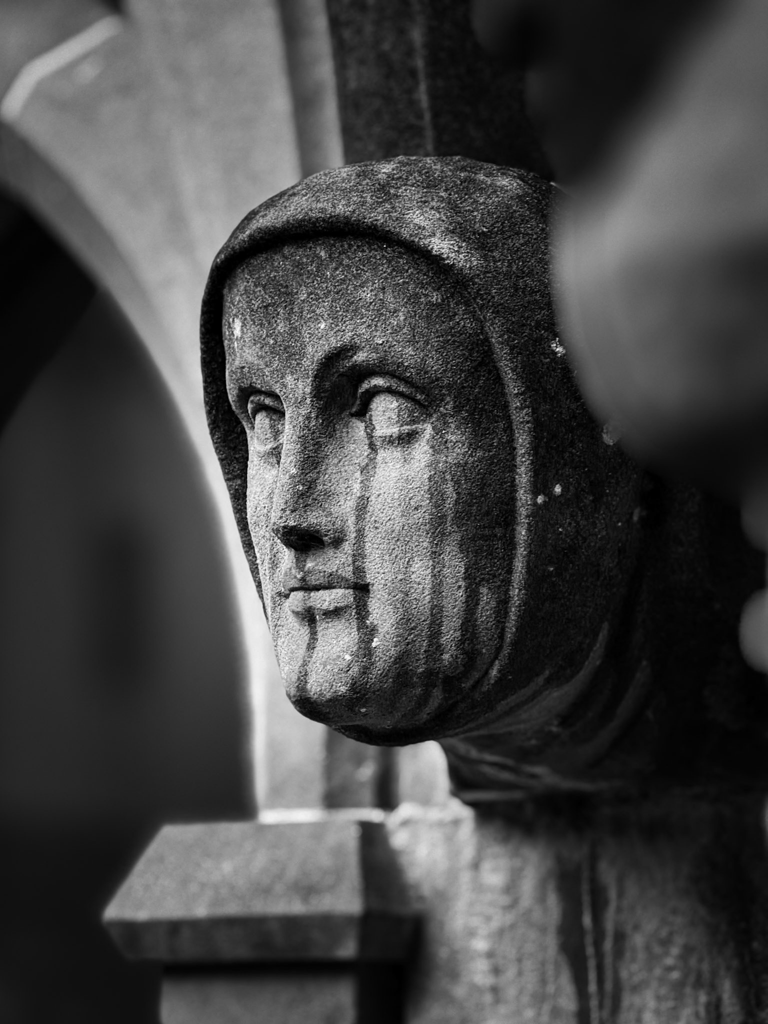 Crying nun pedimental Nun on Fort Augustus Abbey with rain dripping down like tears