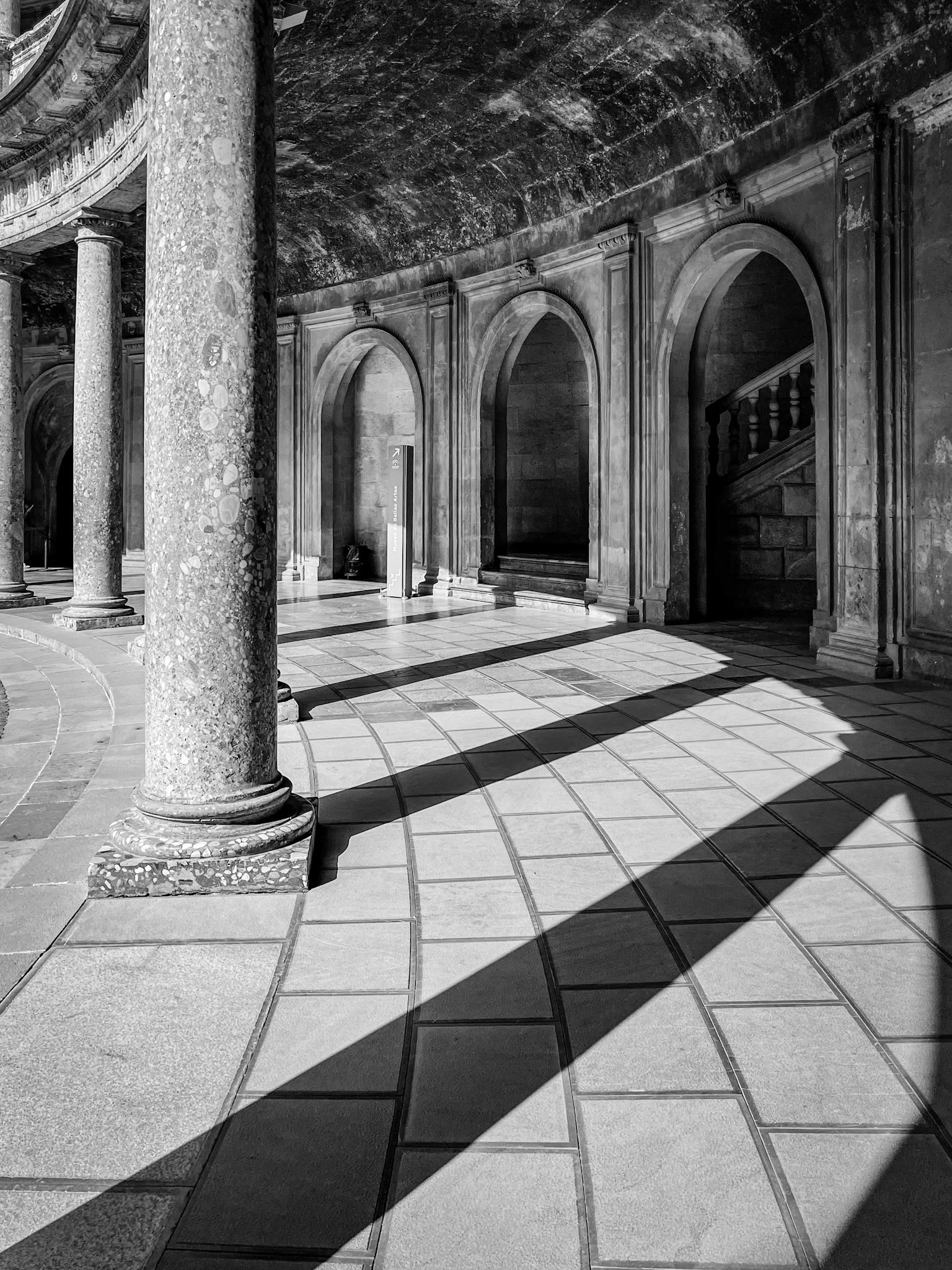Place of Charles V at Alhambra with columns and shadows