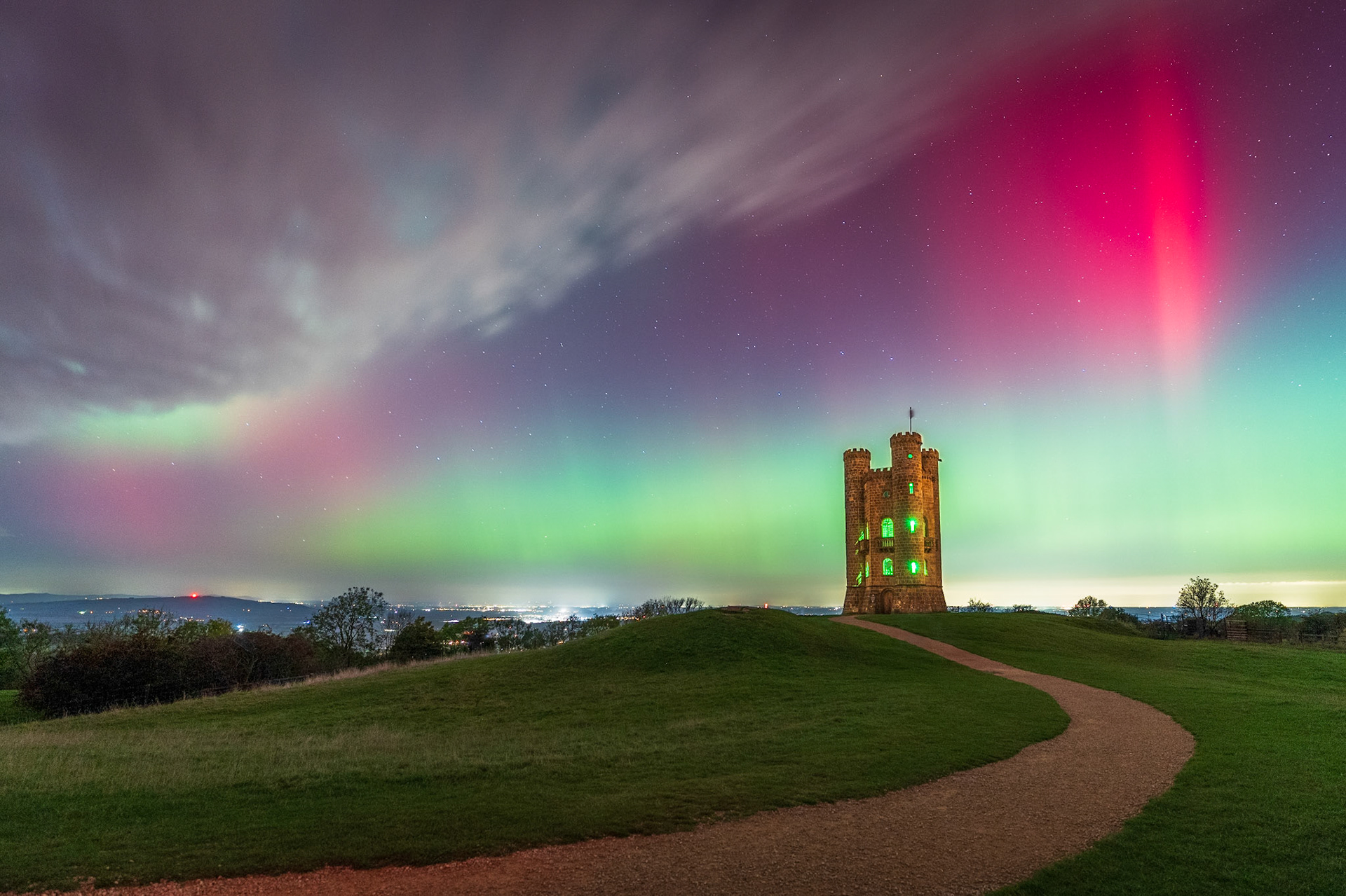 The aurora shone brightly on this Autumn evening, where the clouds cleared just in time for the pillars of light to be visible of the Aurora Borealis. It's a rare sight in England, especially to see it so brightly.
