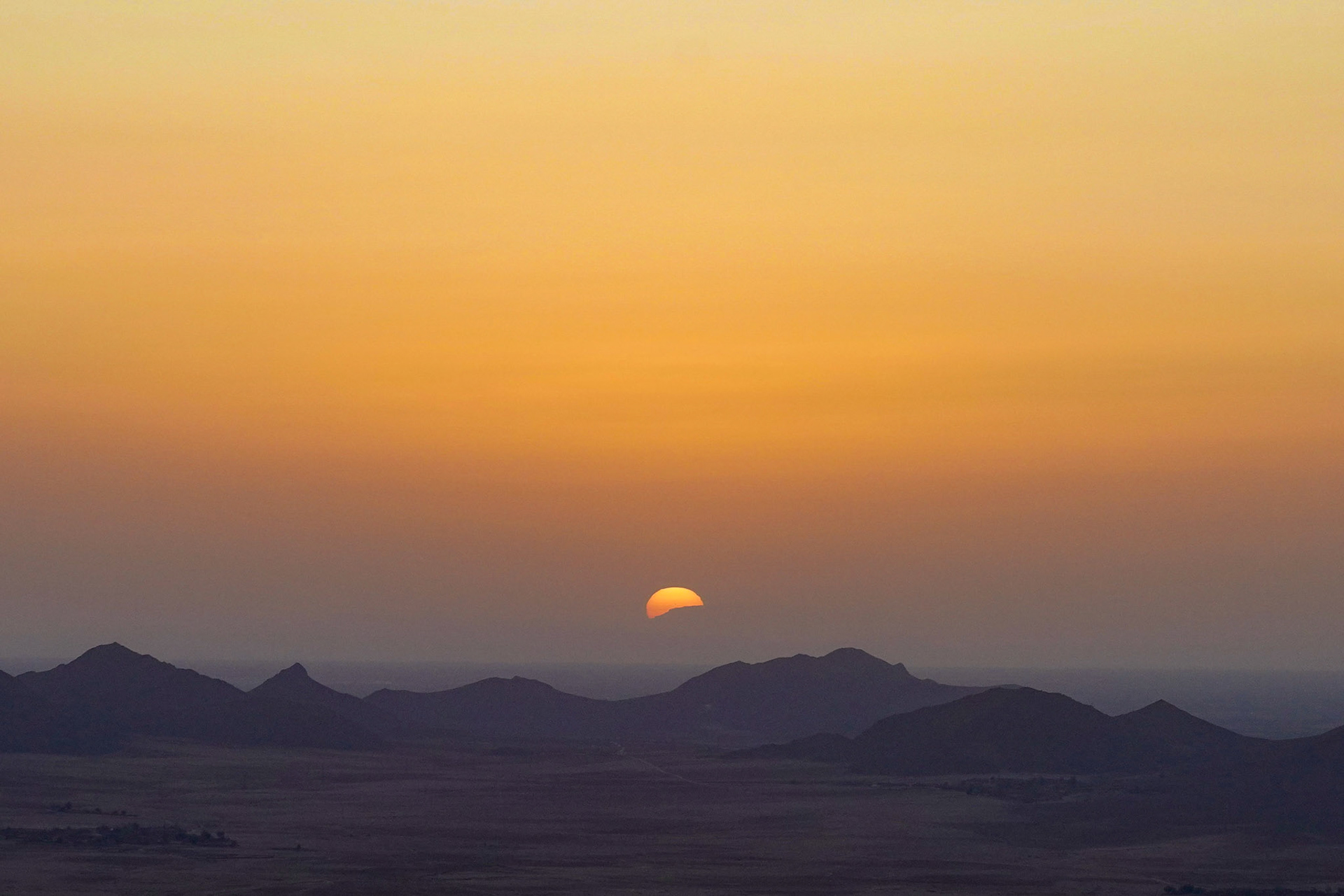 Sunrise over the Moroccan vast desert from a hot air balloon