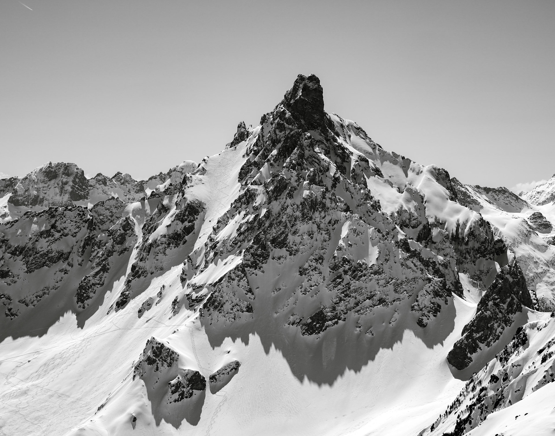 Deep shadows show the ridge line of this mountain peak in Chamonix, France. Black and White