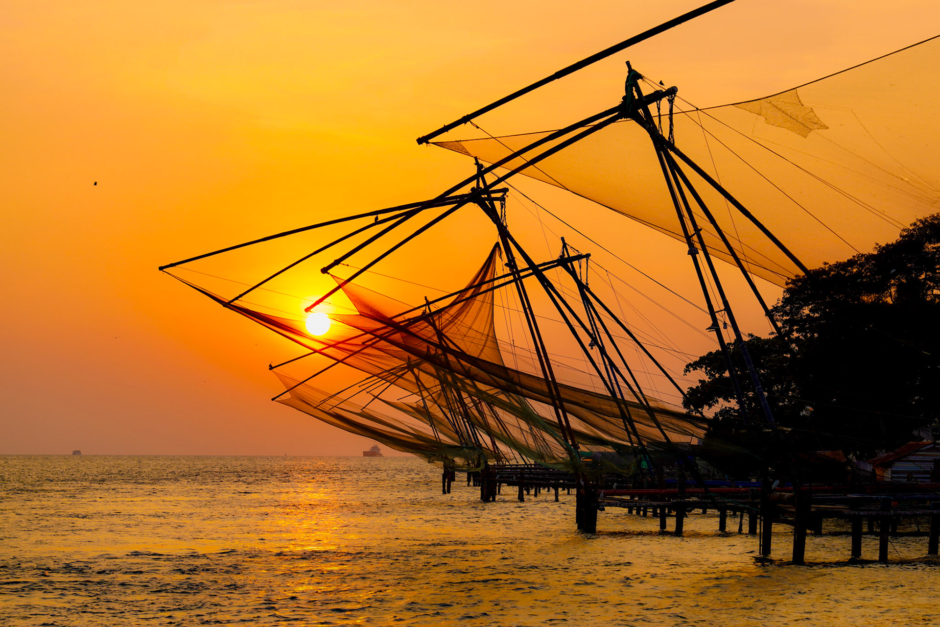 The Chinese Fishing nets in Kochi, Kerala, India, during a magical sunset.