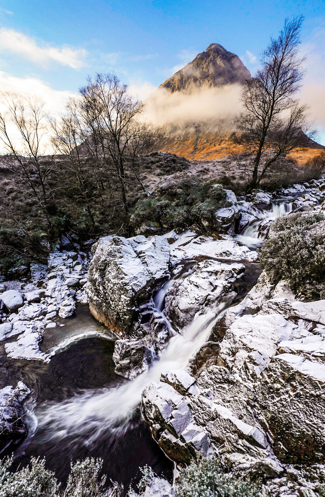 Waterfall of River Etive under the Buachaille during a frosty winter morning, Glencoe, Scotland