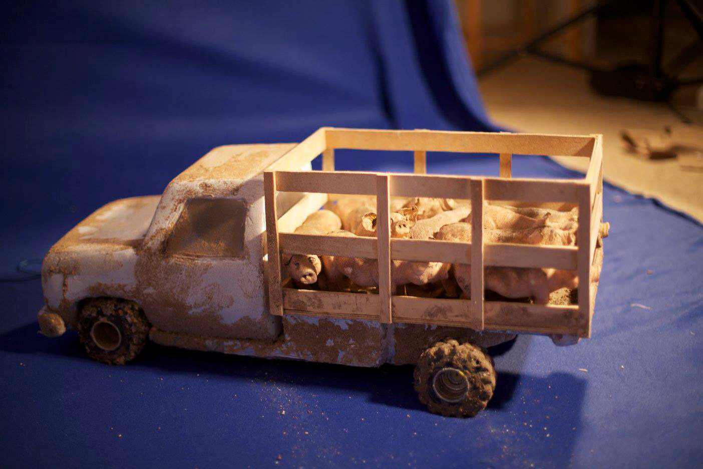 1.5 ft truck filled with foam casted pigs from sculpt
