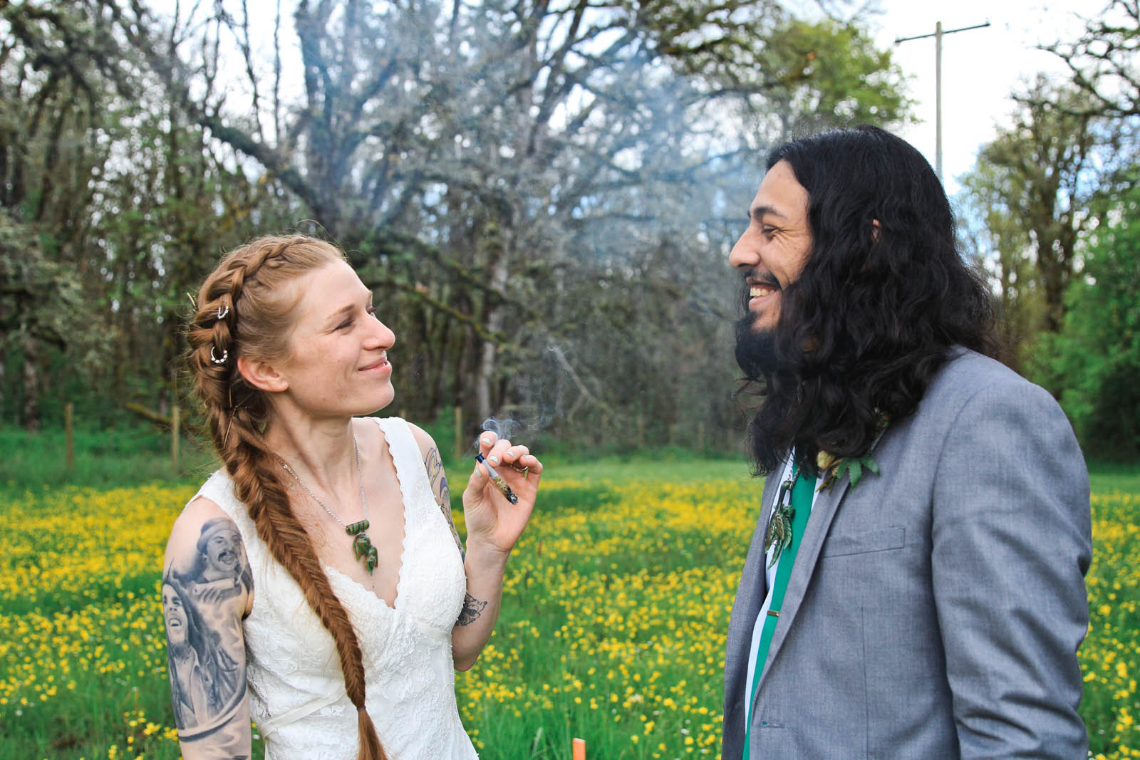 Oregon wedding on 4/20, bride and groom happily smoking together