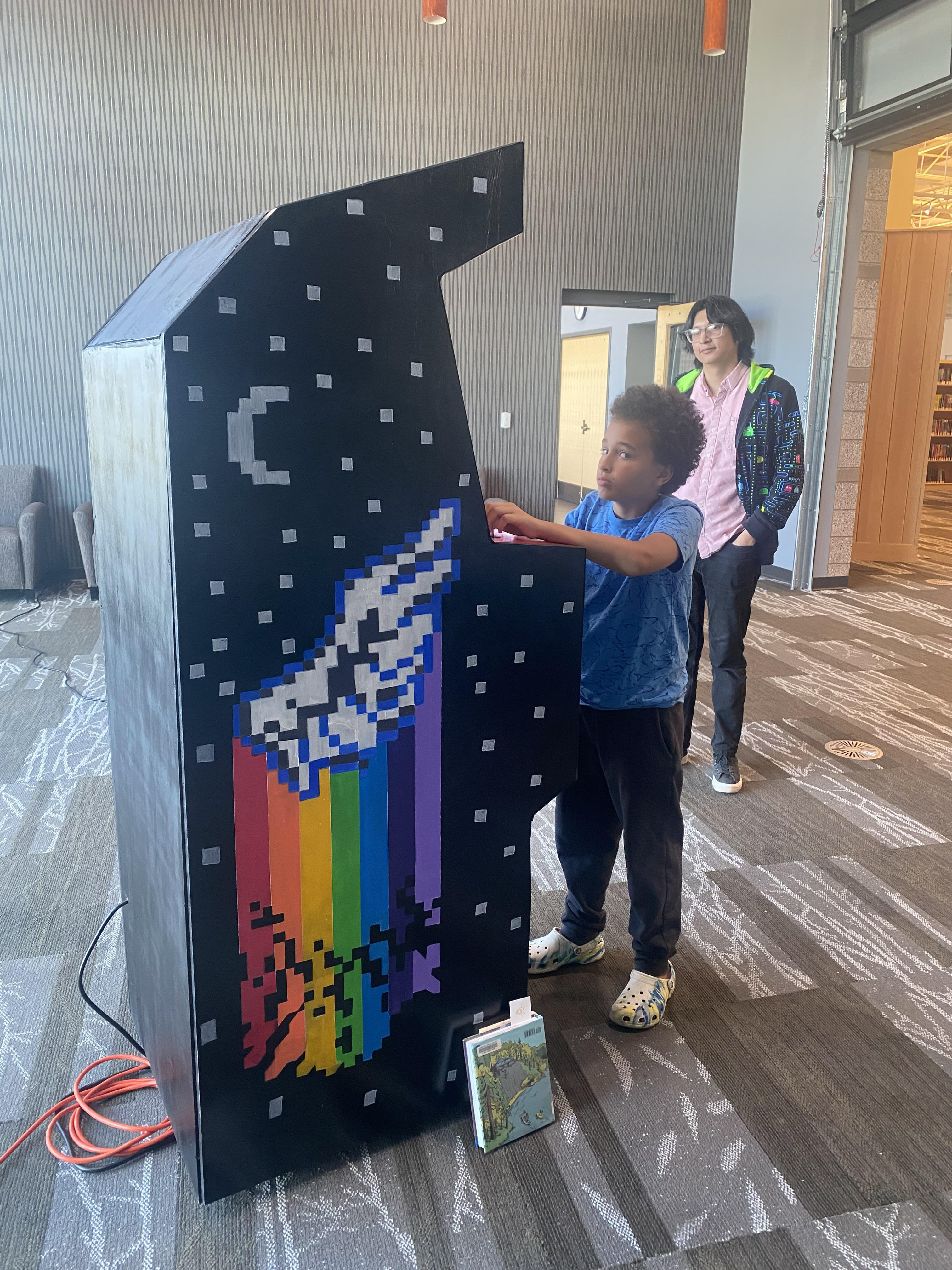 Arcade Machine designed and painted for Anythink