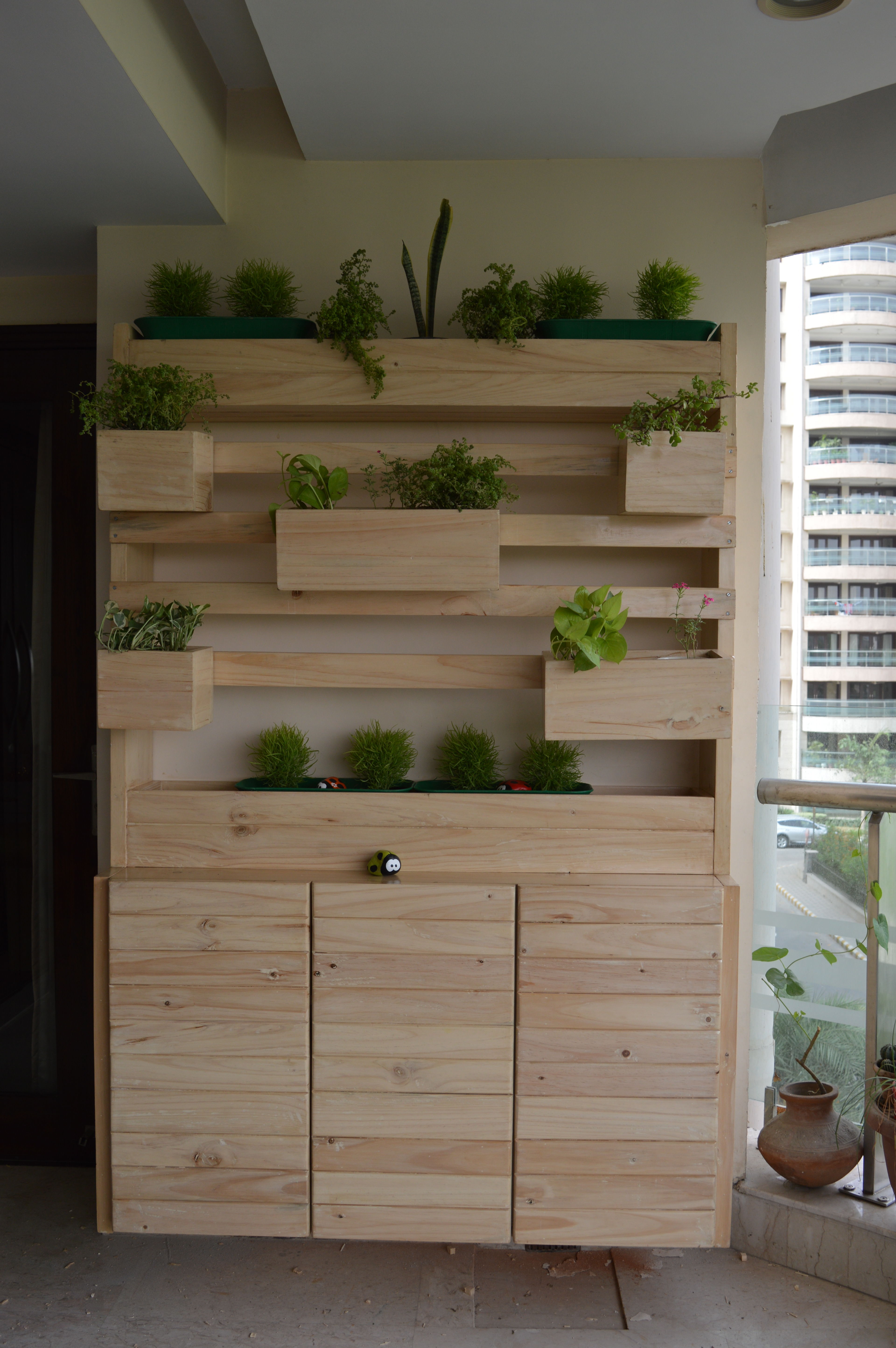 entryway vertical garden with  storage