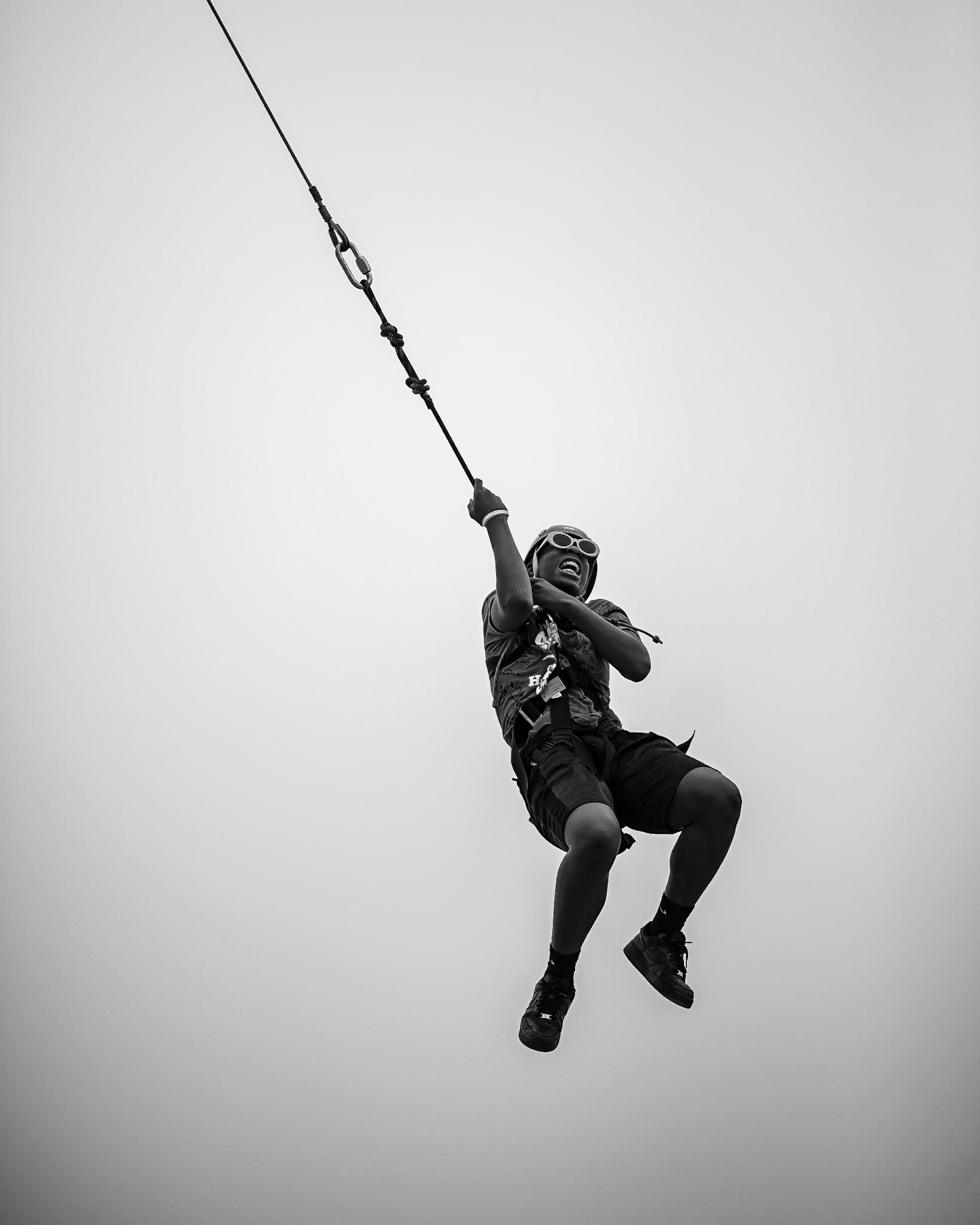 Part of Camp Harbor View's set of activities on Family Day was a rock climbing wall and swing.   Campers were raised into the air through a pully system and then released.
