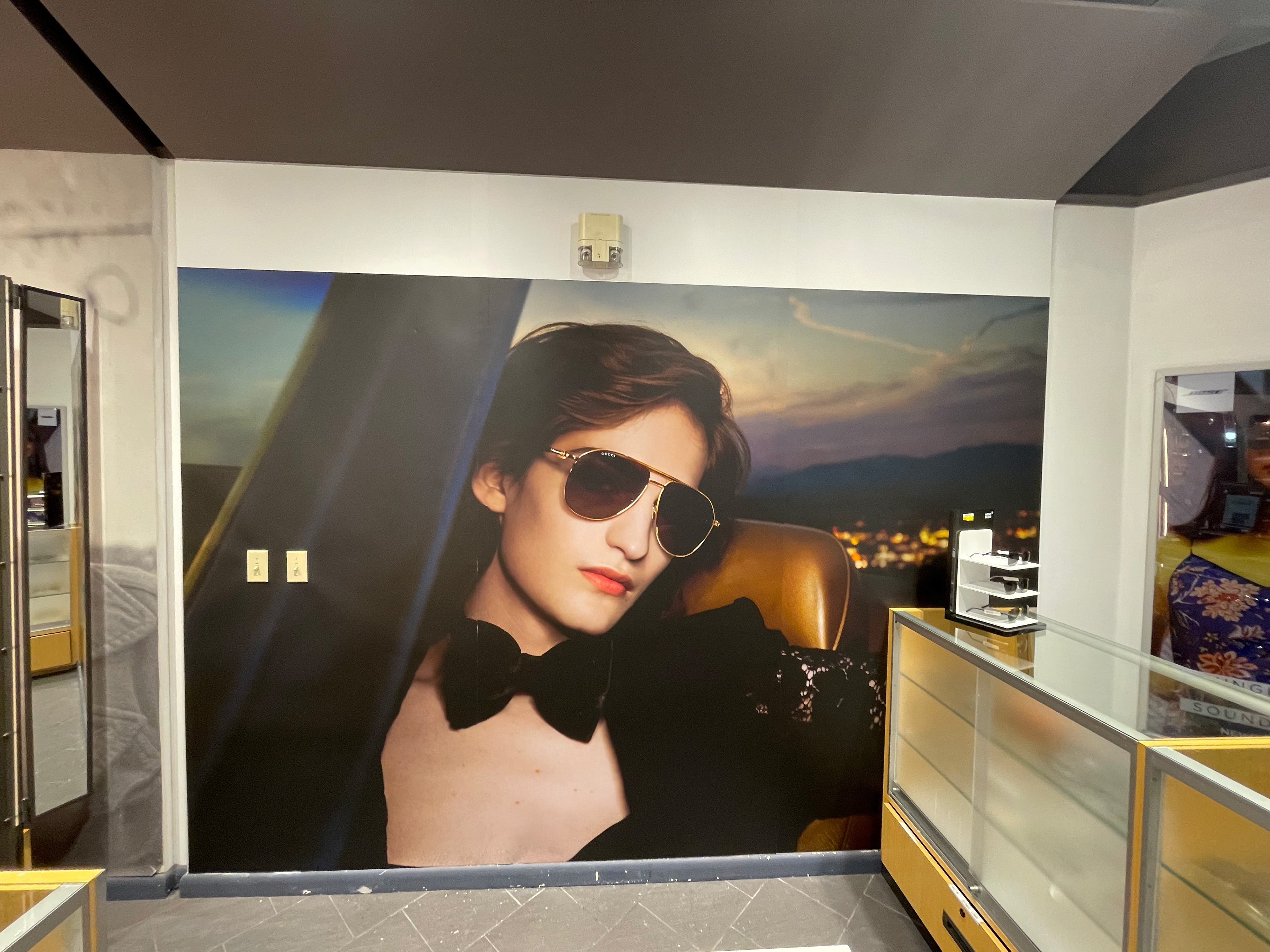 With team of two mount and produce visual at store.