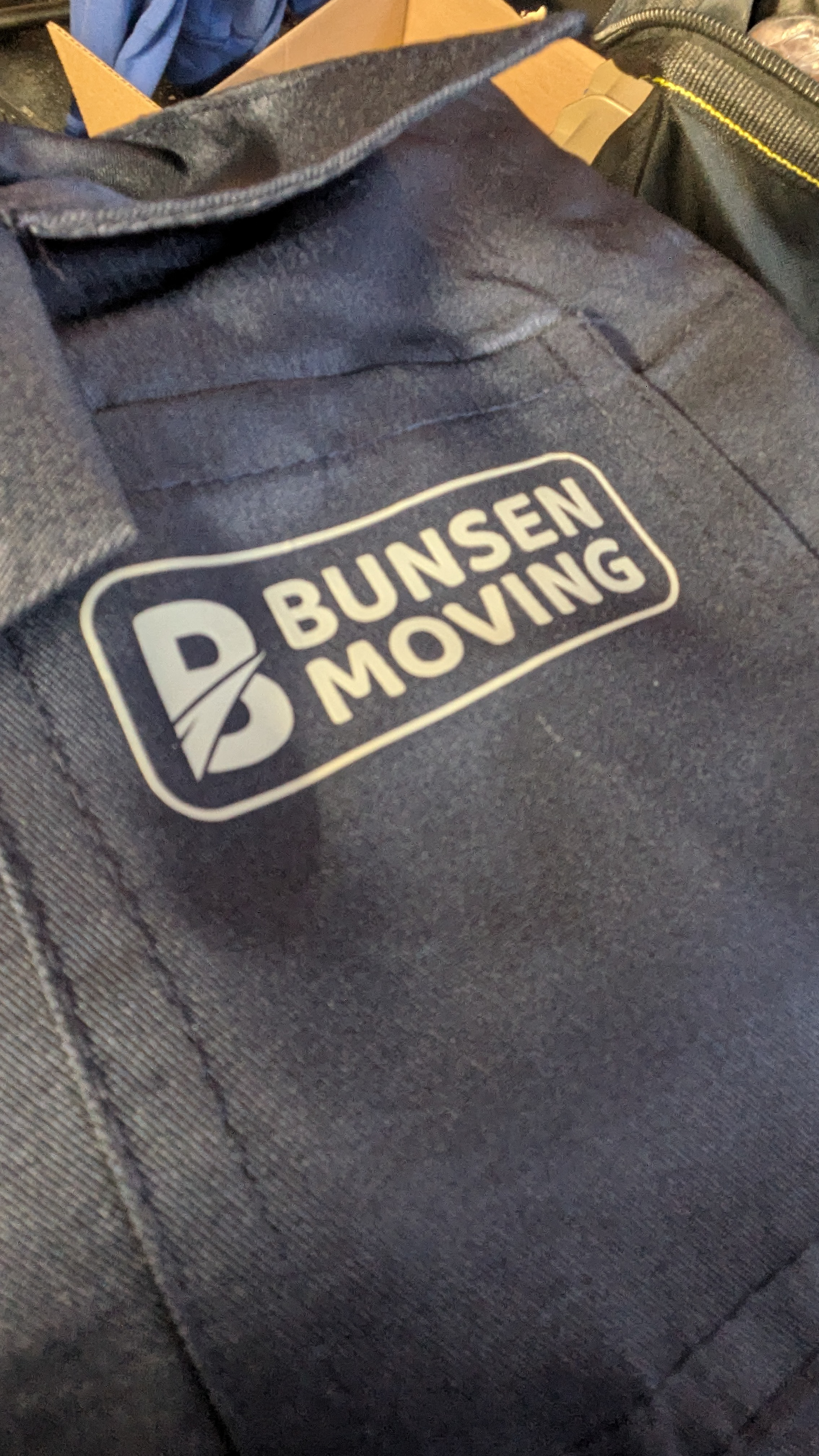 Custom logo made by a graphic designer we worked with. I had cut from heat-transfer vinyl and applied to wardrobe.