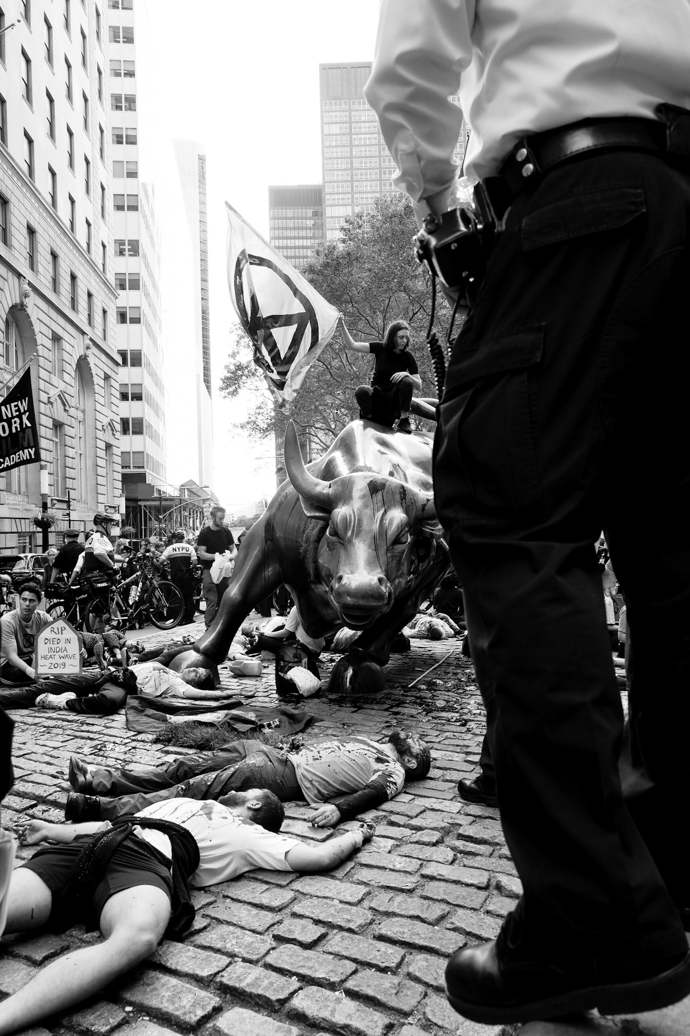 Extinction Rebellion climate crisis protest, Charging Bull statue, NYC NY. October 7th, 2019