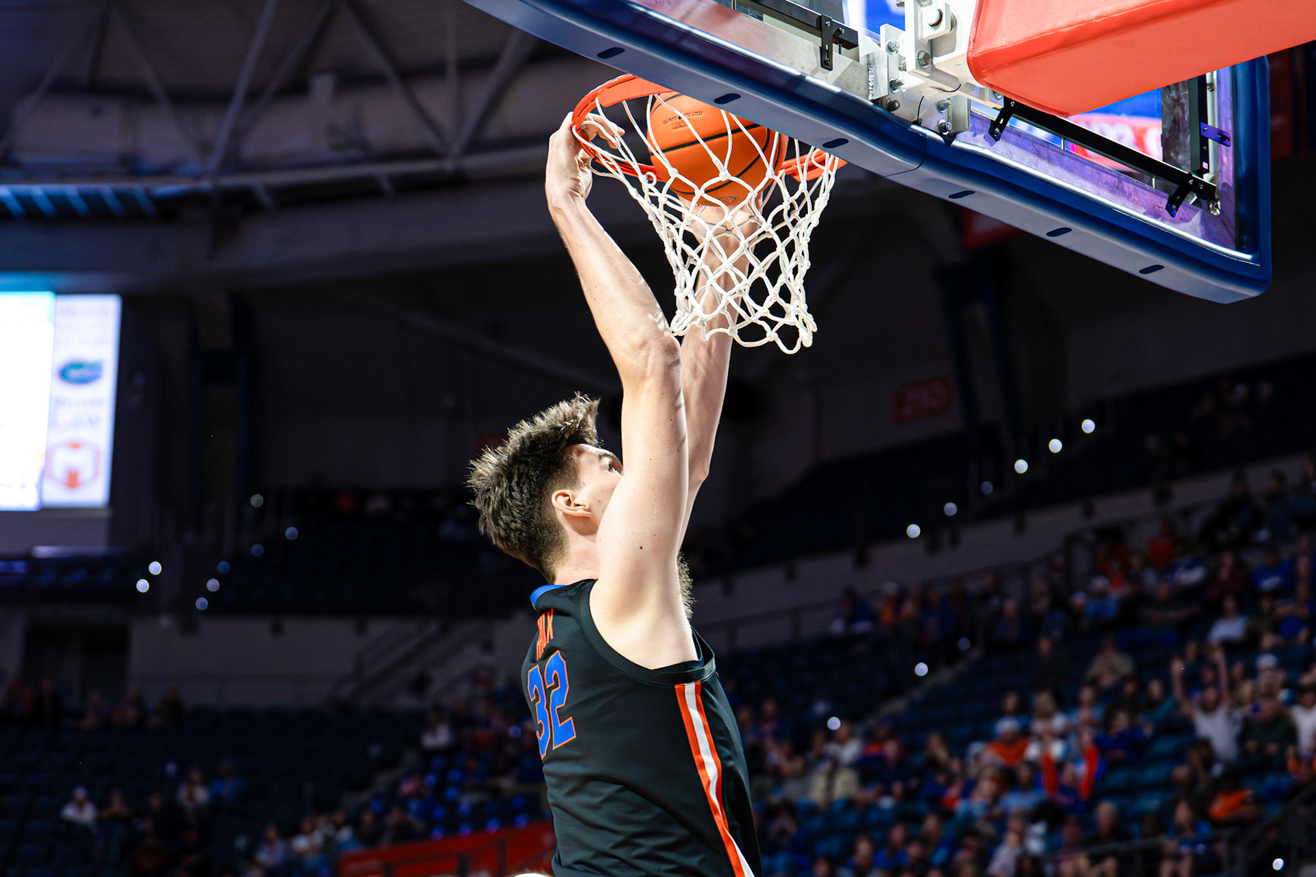 Florida center Olivier Rioux (32) makes his first colligate bucket against Saint Francis during the second half of an NCAA college basketball game  Wednesday, Dec. 17, 2025, in Gainesville, Fla. (AP Photo/Morgan Hurd)