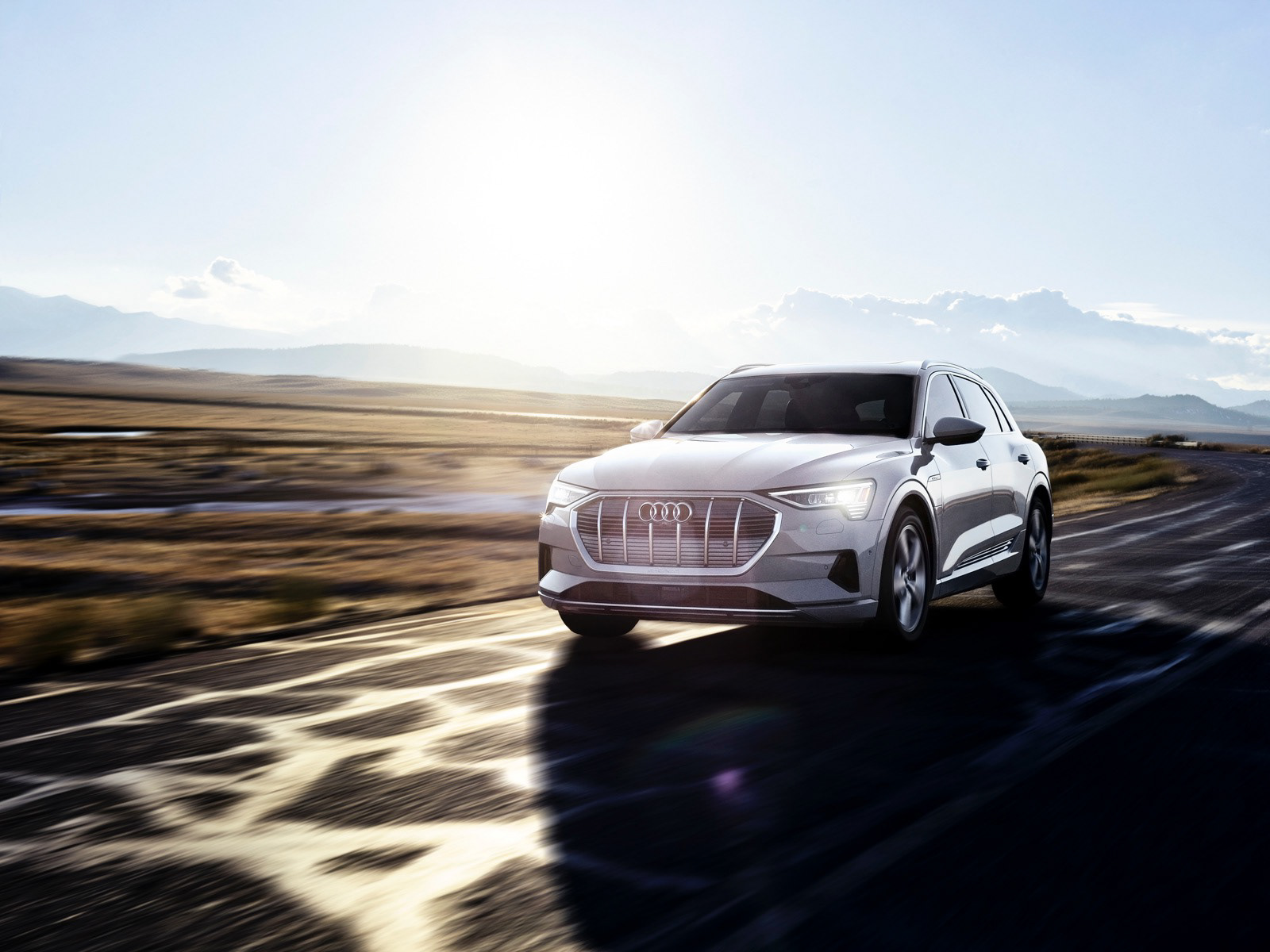 alt="Retouching and color grading for Audi e-tron campaign, showcasing the all-electric vehicle’s sleek design, shot by Even Robinson"