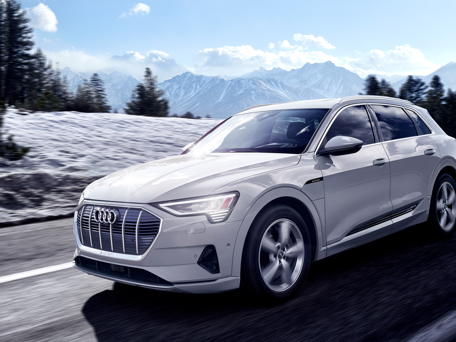 alt="Retouching and color grading for Audi e-tron campaign, showcasing the all-electric vehicle’s sleek design"