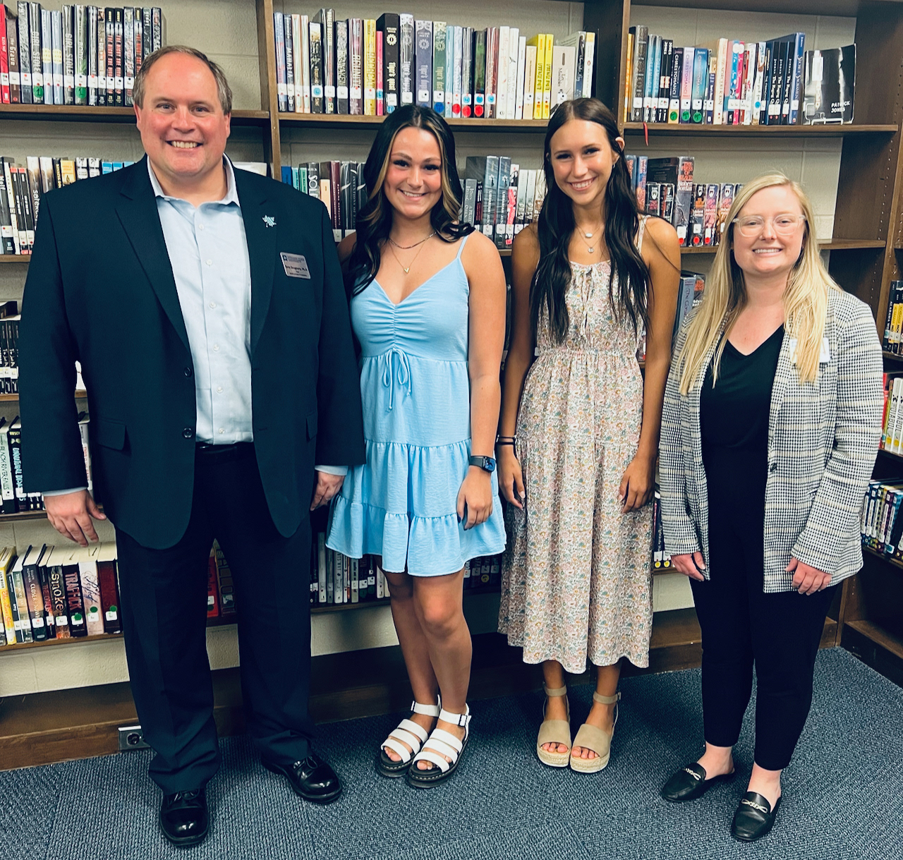 Dean Terry Daugherty and Madison Marshall with NVHS students Gracie Taylor and Kenzie Knowles. Gracie will be joining the college in the fall of 2022.