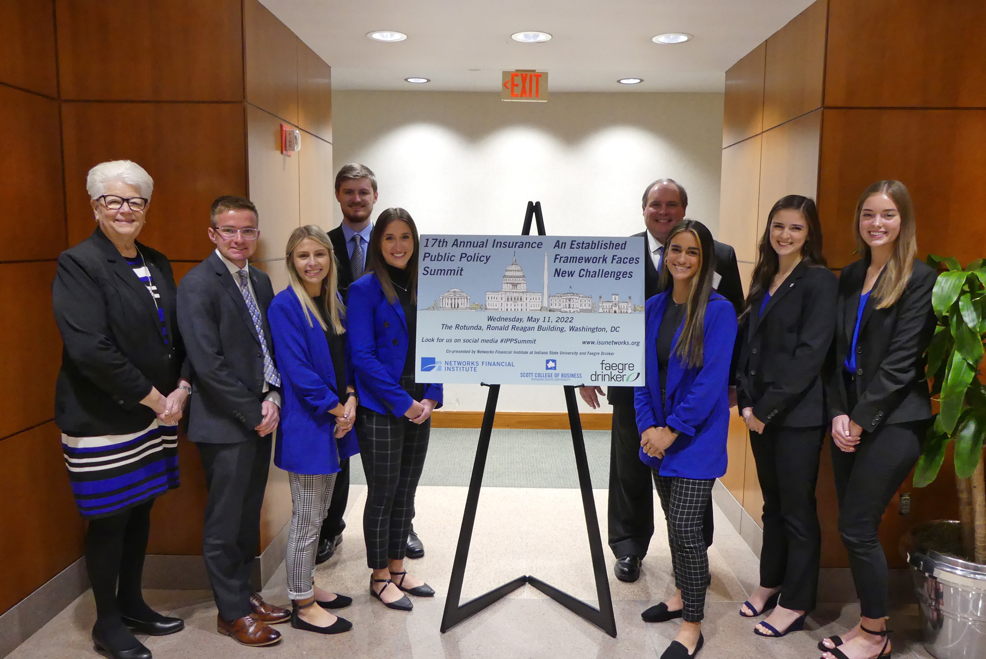 Indiana State Prseident, Deborah Curtis and dean, Terry Daugherty with students