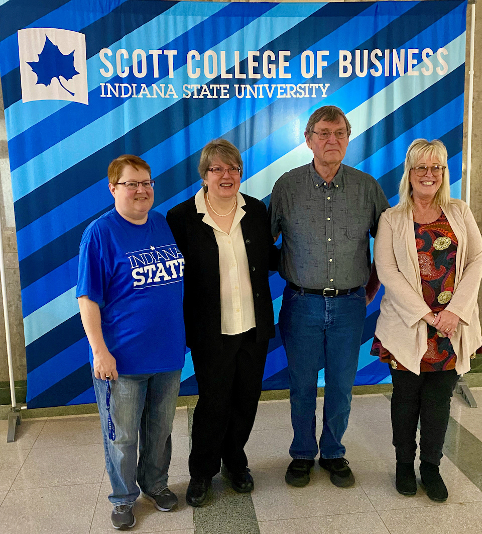 Carolyn Dages, Administrative Assistant for Graduate Programs with her husband and administrative assistants Leatha Waugh and Ruth Rukes