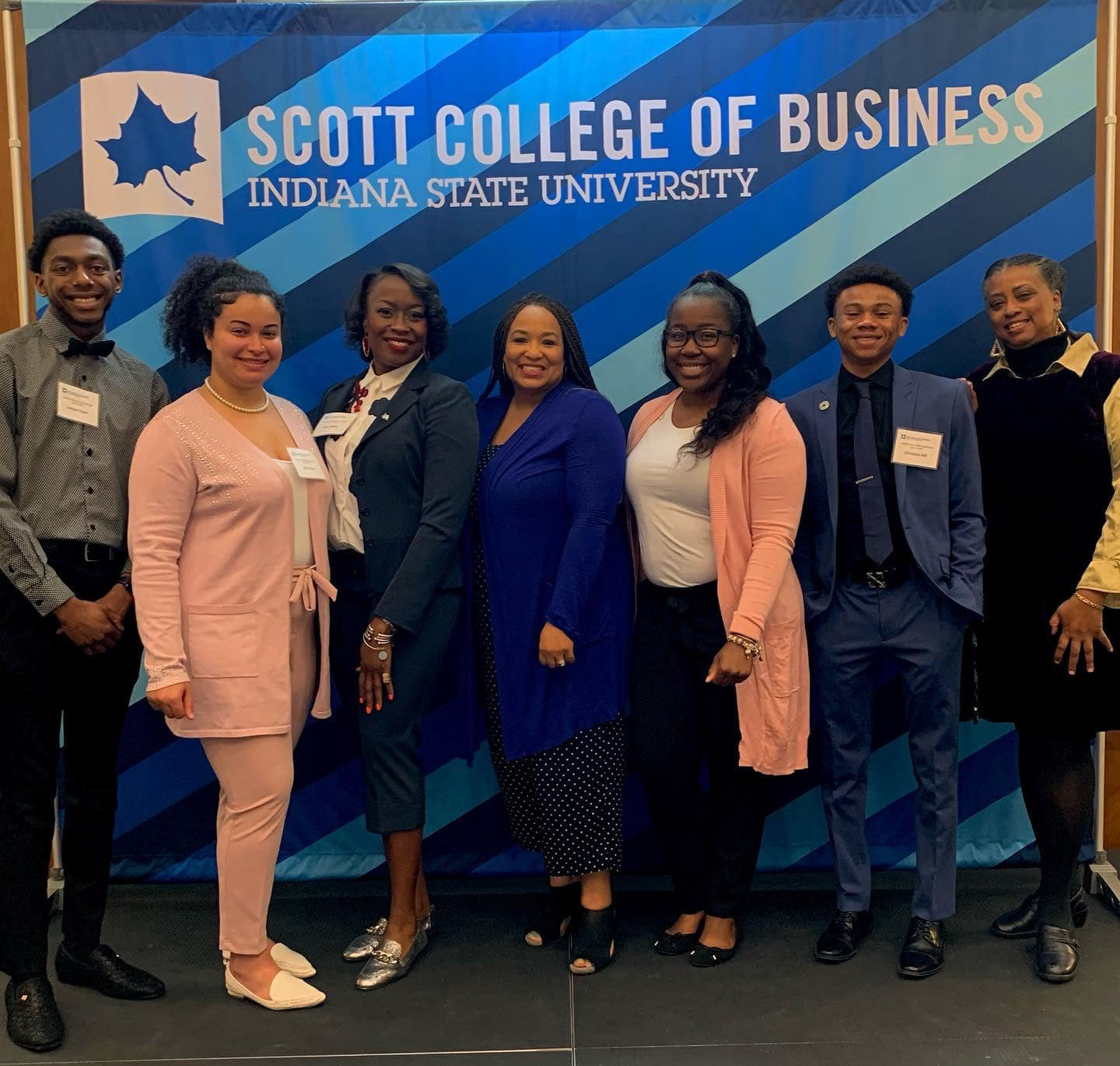 Members of the Charles E. Brown African American Cultural Center with Tiana Baker. LeJuan Exum on left