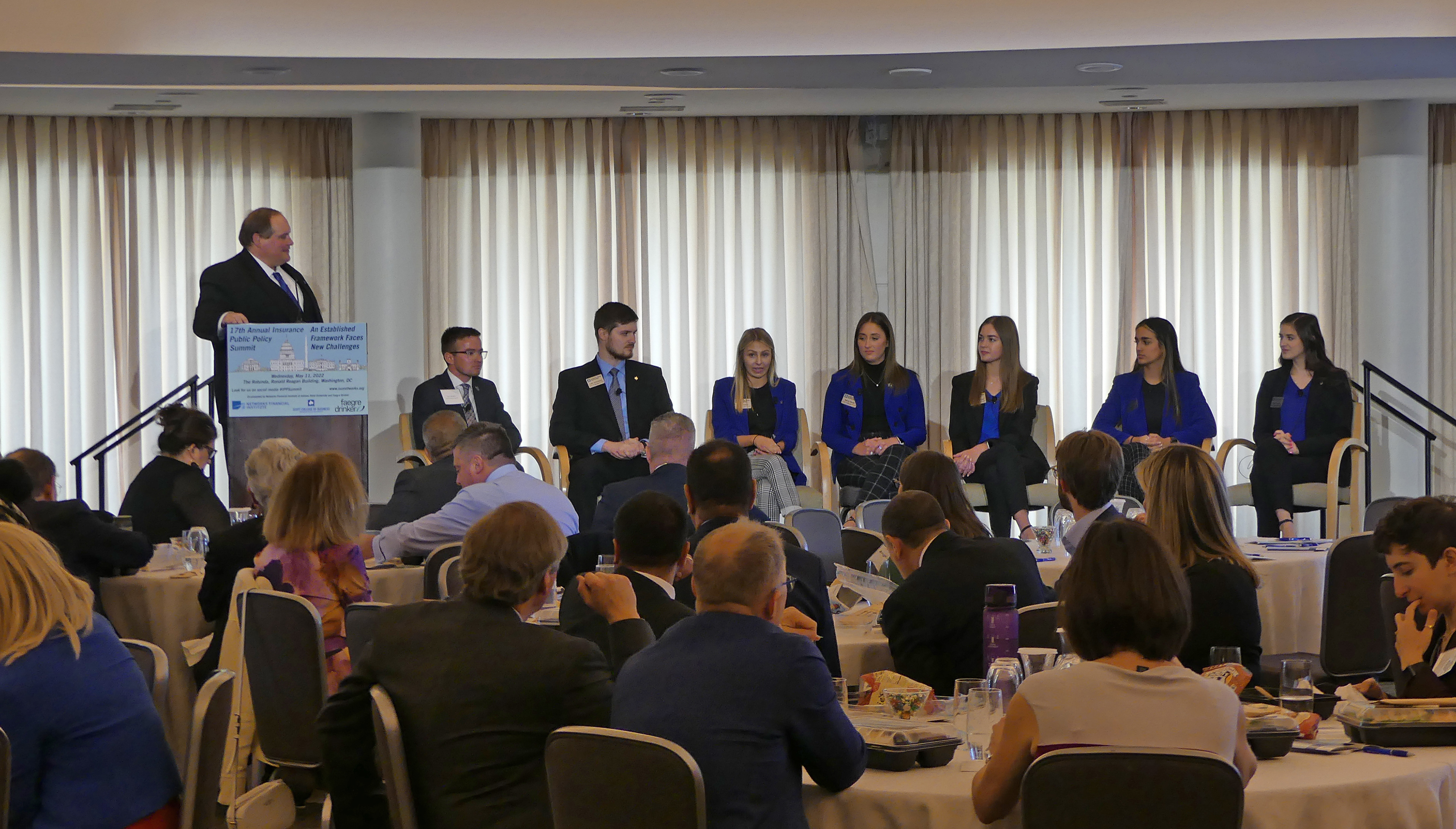 Terry Daugherty, Dean, Scott College of Business with students Sam Bowen, Luke Summerlot, Julia Sonntag, Hailey Tonsor, Audra Doedtman, Jillian Turner, and Grace Longyear