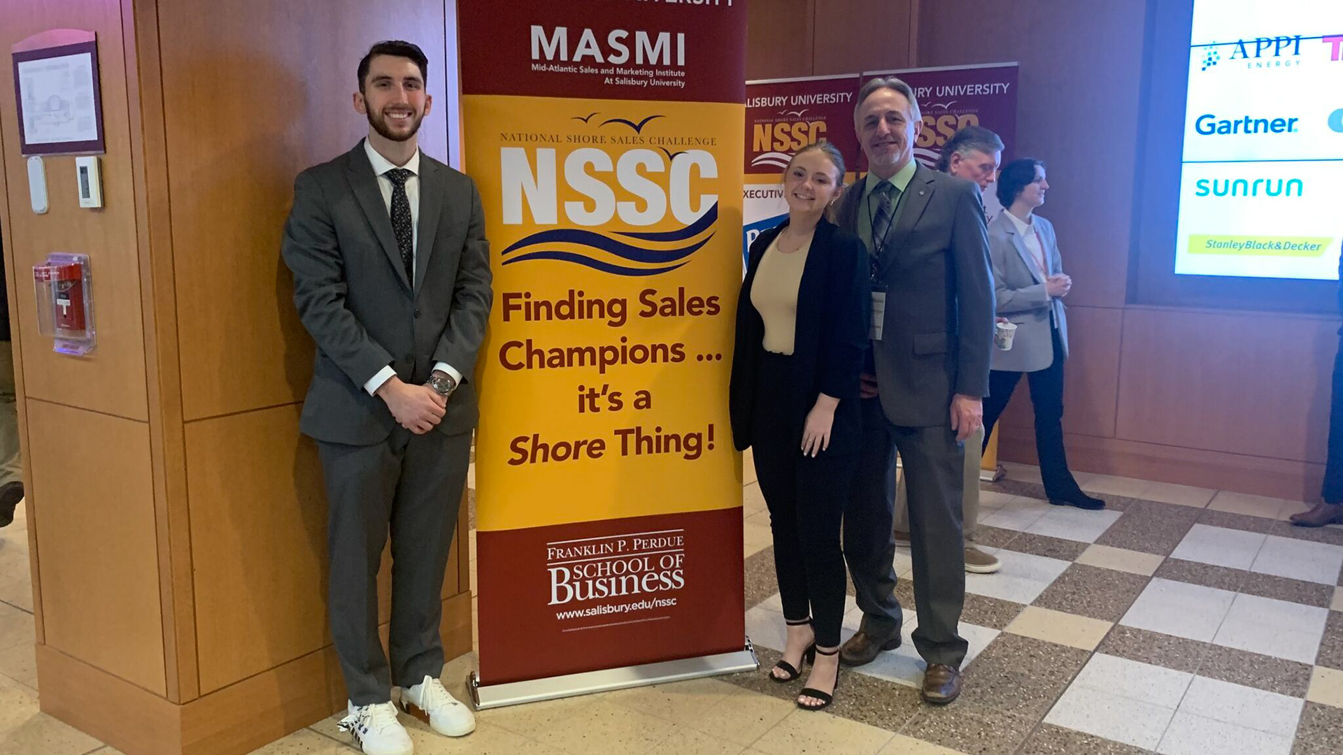 Students Connor Lash and Brin Bair with Dr. Ricky Fergurson