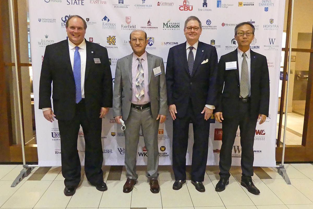 Terry Daugherty, Tarek Zaher, Christopher Vincent, and Jin Park