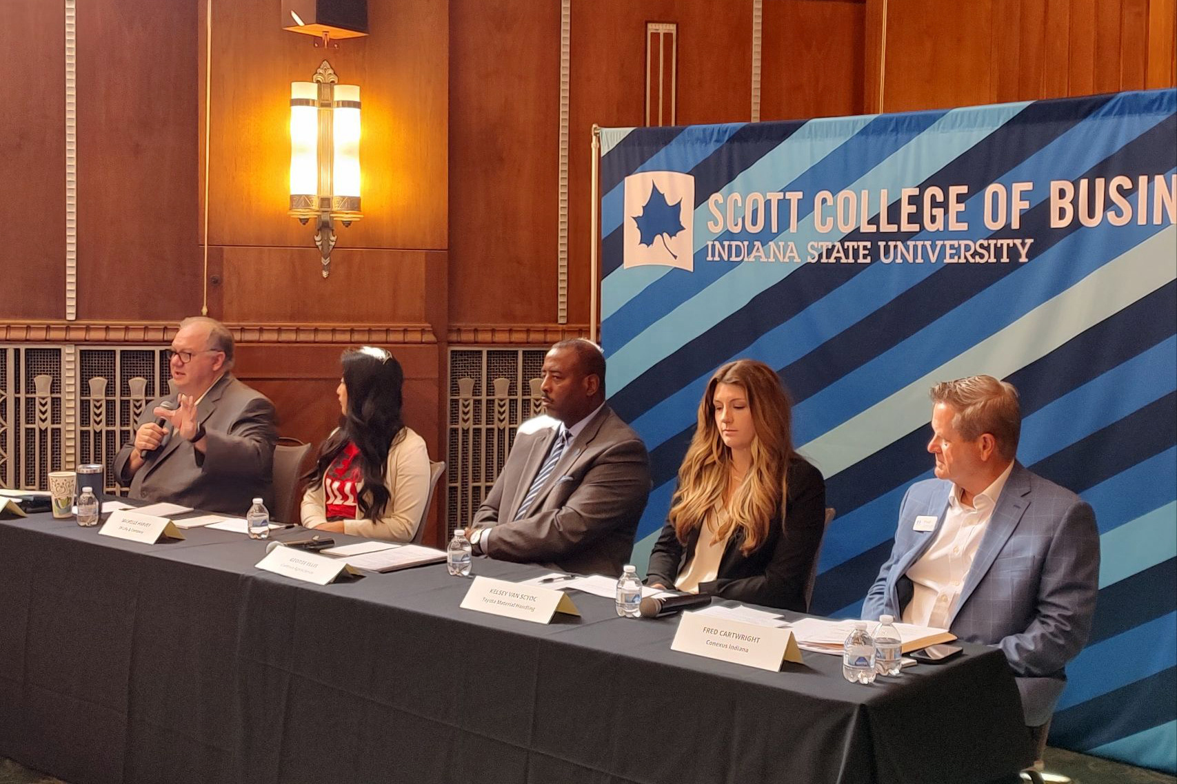 The panel discussion with Mark Linville, Rolls Royce; Michelle Harvey, Eli Lilly & Co.; George Ellis, Corteva Agriscience; Kelsey Van Scyoc, Toyota Material Handling; and Fred Cartwright, Conexus Indiana.