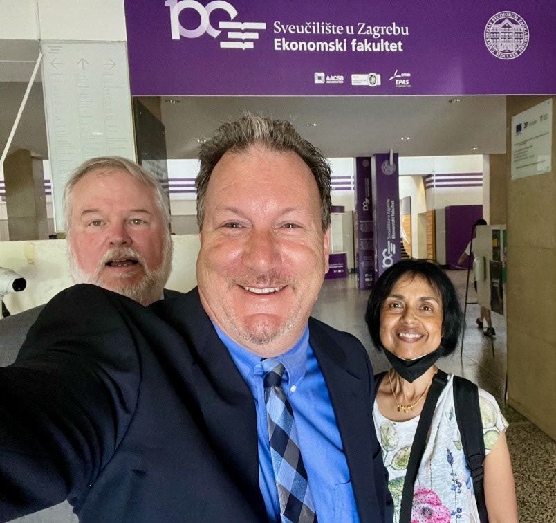 Dr. Chris McGrew (Director of Center for Global Engagement), Dr. Rust Gonser (Professor of Biology), and Dr. Aruna Chandrasekaran (Chair of MISBE) at the University of Zagreb in Croatia, June 2022. They were on a trip visiting with the university leadership discussing academic partnerships and study abroad opportunities for Indiana State students.