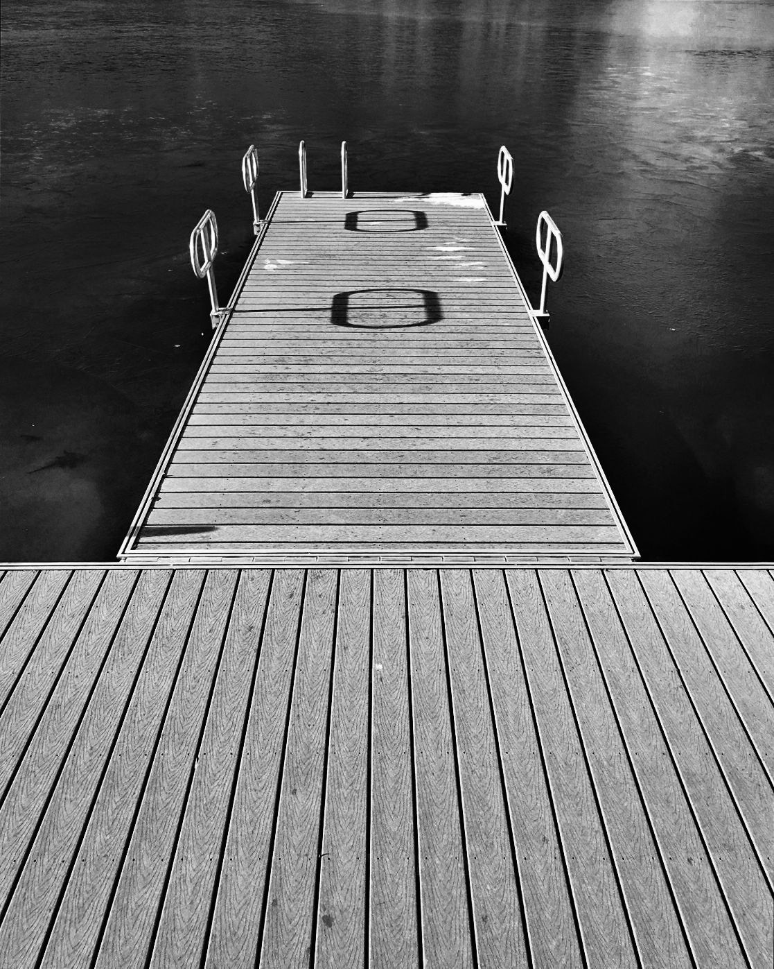 The black-and-white version of the paddle boat pier at Allen Pond Park, Bowie, Maryland