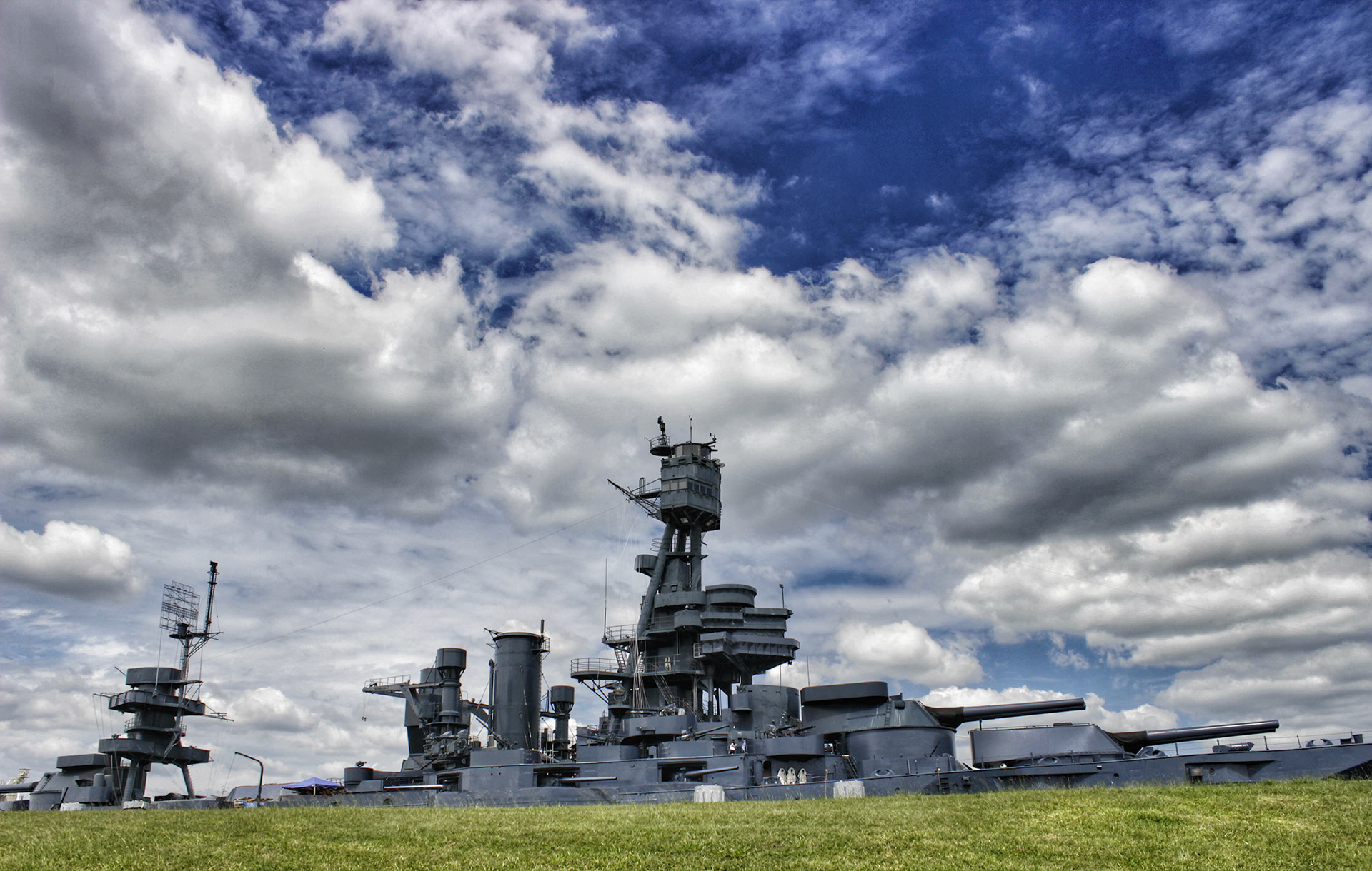 The USS Texas (BB35) uses a submerged dry dock to remain afloat as it undergoes repairs - La Porte. Texas