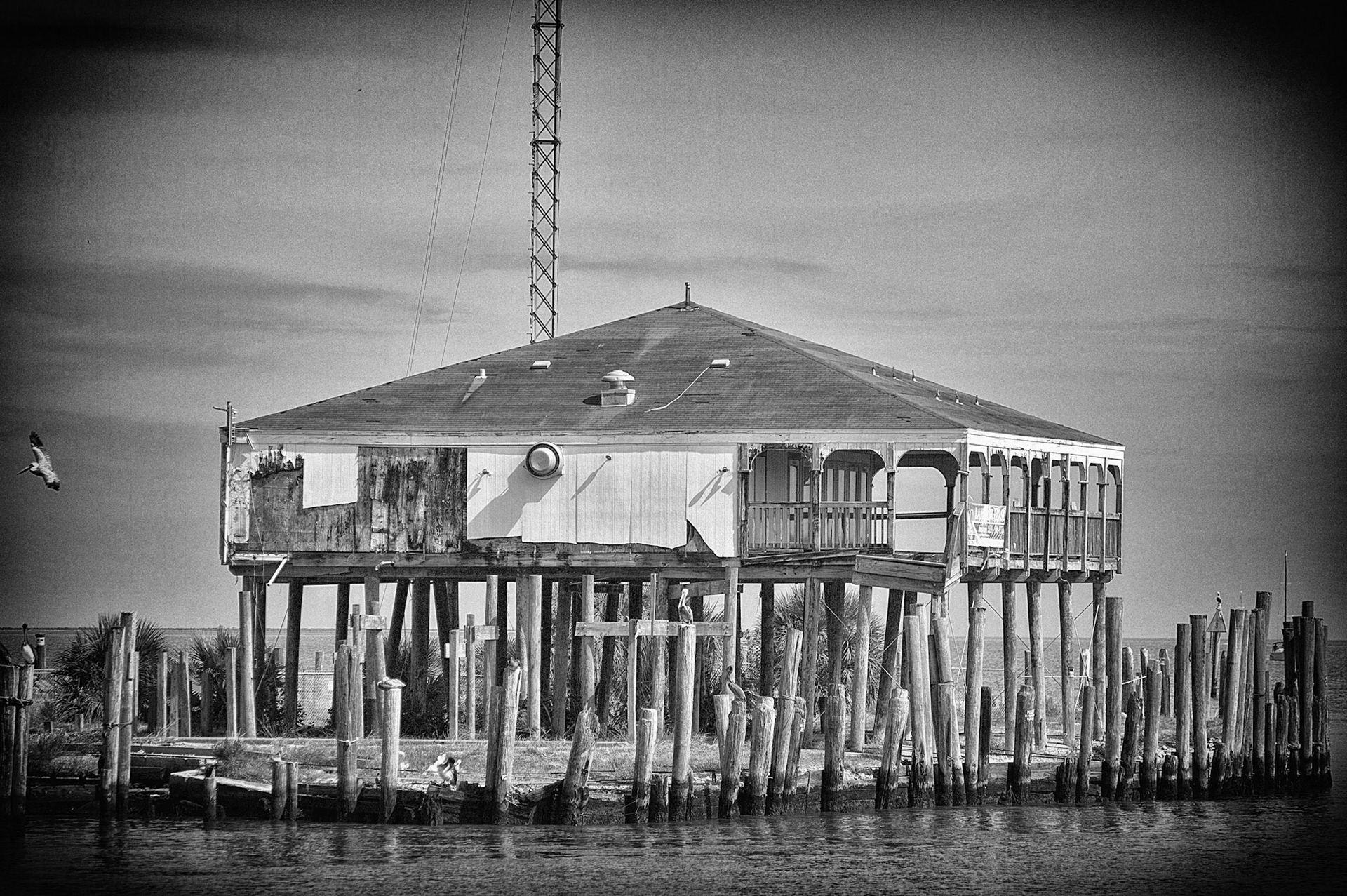 Storm-damaged Seafood Restaurant across the channel from the Kemah (Texas) Boardwalk. It has since been torn down.