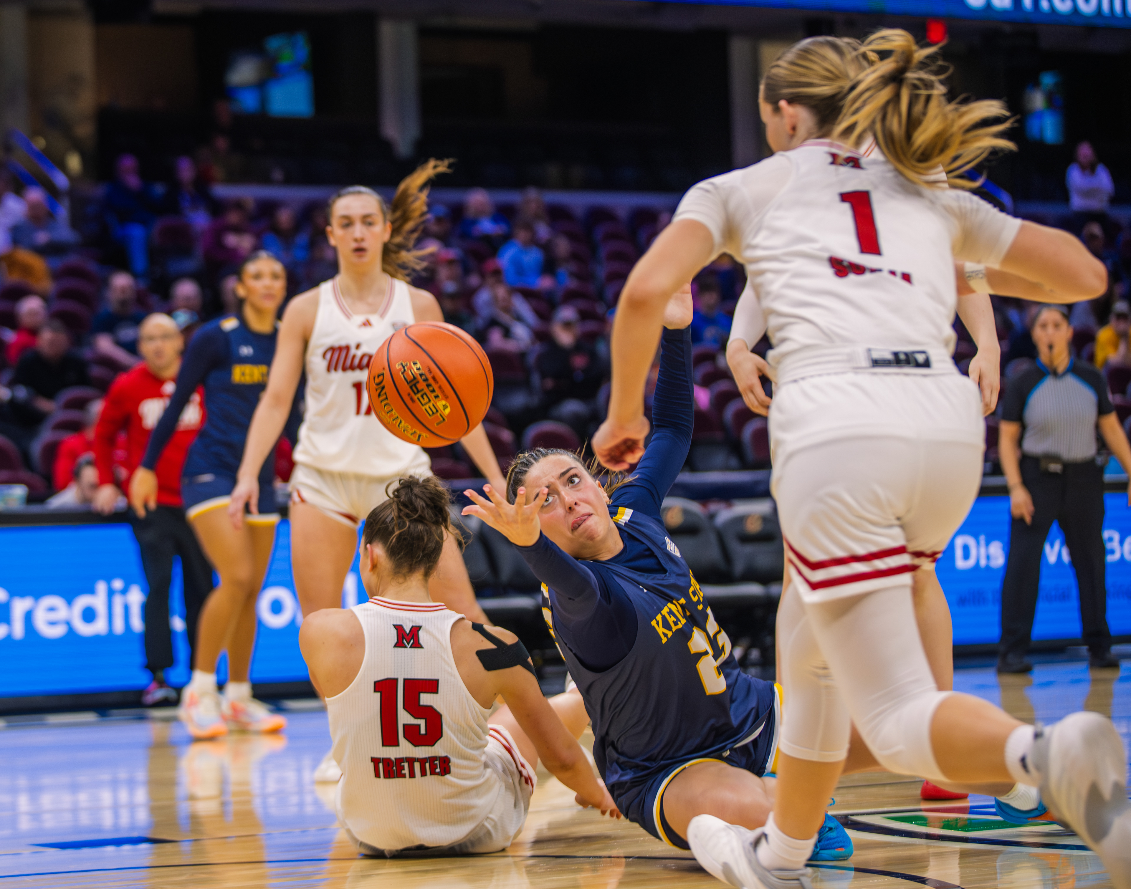No easy plays, as a Kent State guard finds a way to keep the ball alive from the floor against Miami (OH) in the MAC Tournament quarterfinals.