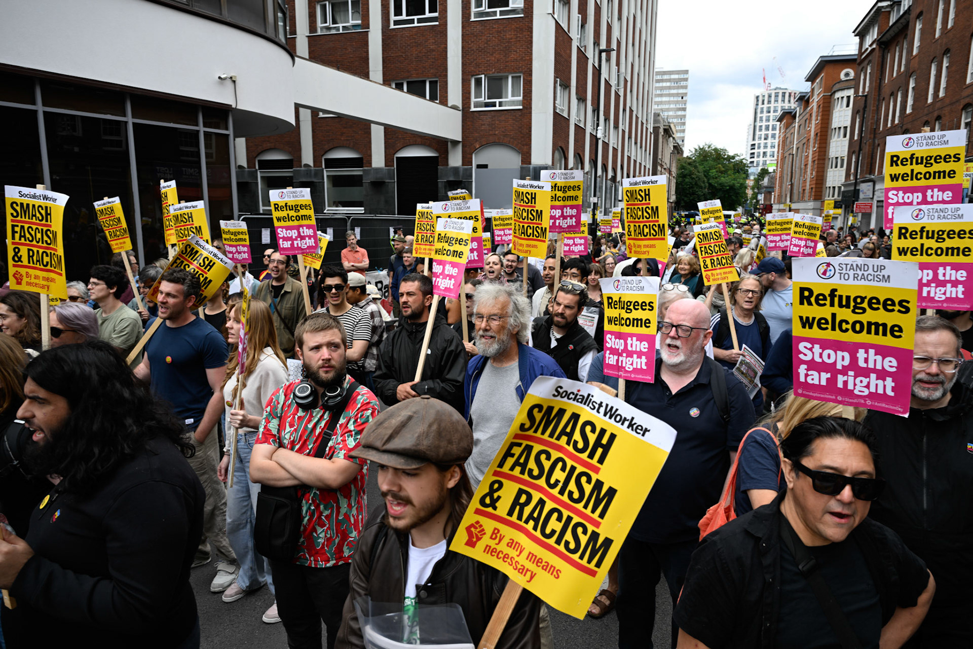 London, UK, 2nd August 2025, Protest outisde of the Thistle Hotel Barbican supporting migrant residents and challenging a counter protest