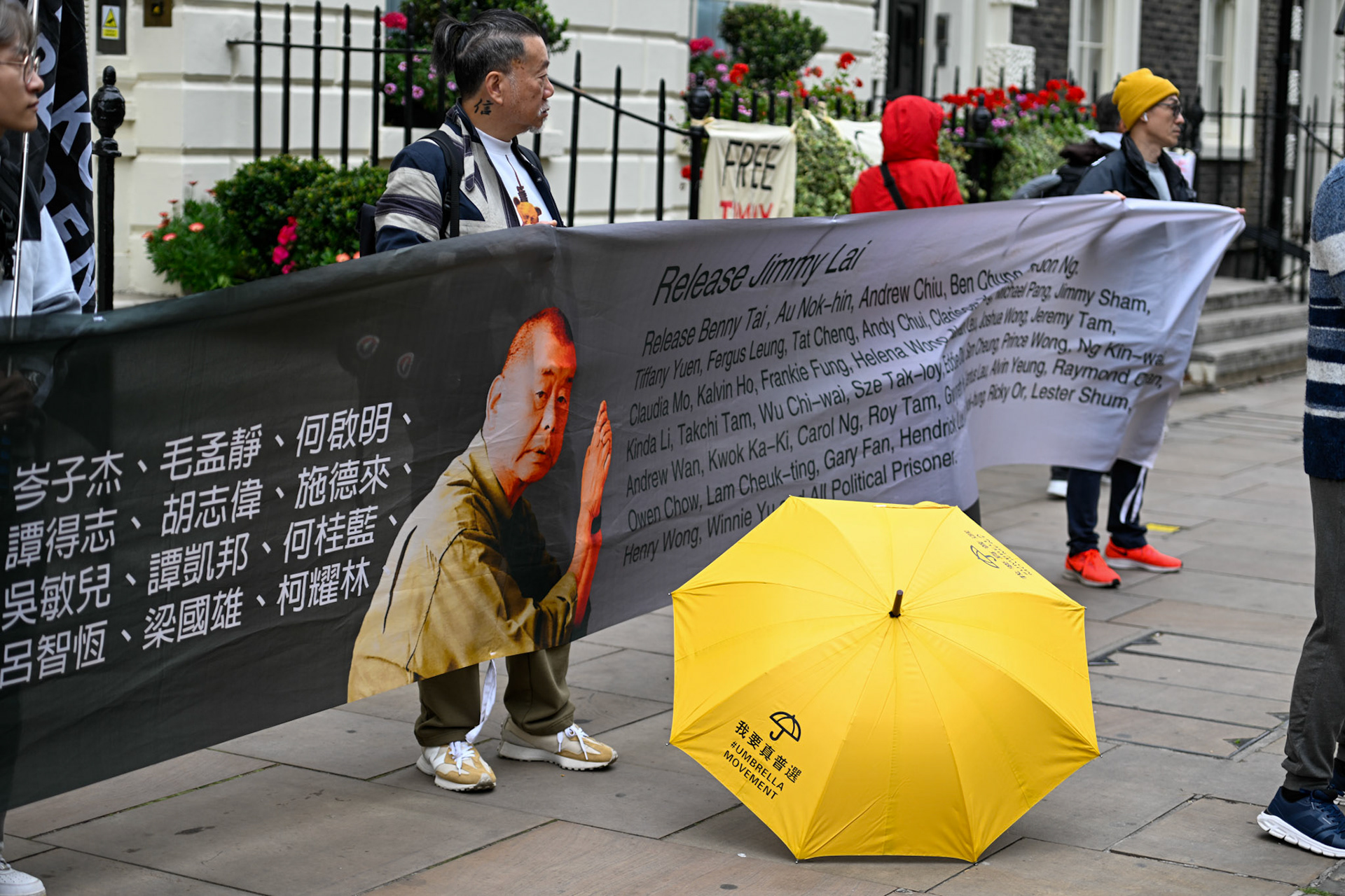 London, UK, 28th September 2025: 11th Anniversary march to commerate the pro democracy protest in Hong Kong in 2014 called the yellow umbrella revolution, monkeybutlerimages/ alamy live news