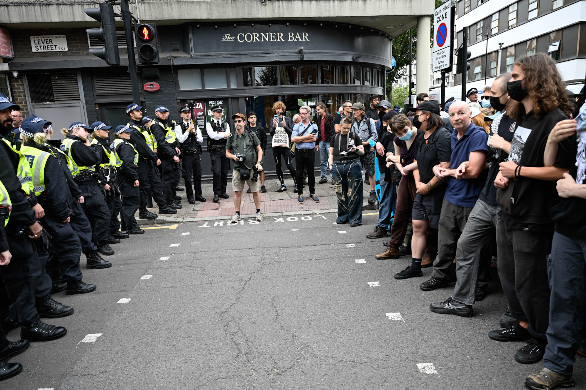 London, UK, 2nd August 2025, Protest outisde of the Thistle Hotel Barbican supporting migrant residents and challenging a counter protest