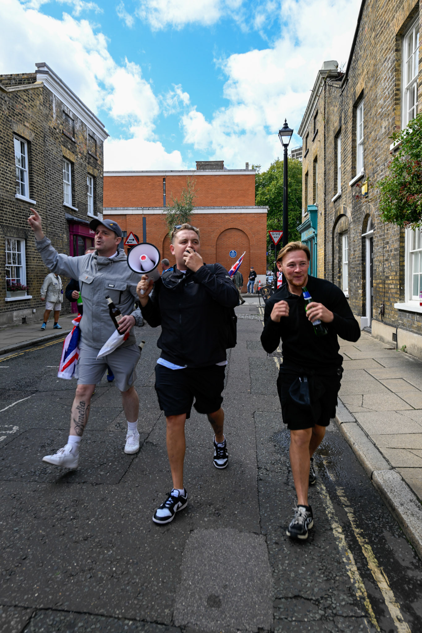 London, UK, 13th September: Approximately 100,000 supporters of Tommy Robinson march through central London,  monkeybutlerimages/alamy live news