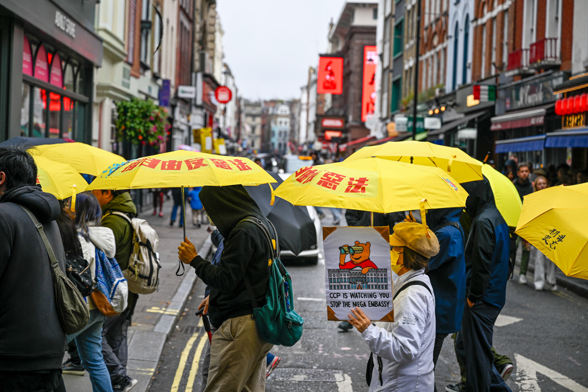 London, UK, 28th September 2025: 11th Anniversary march to commerate the pro democracy protest in Hong Kong in 2014 called the yellow umbrella revolution, monkeybutlerimages/ alamy live news