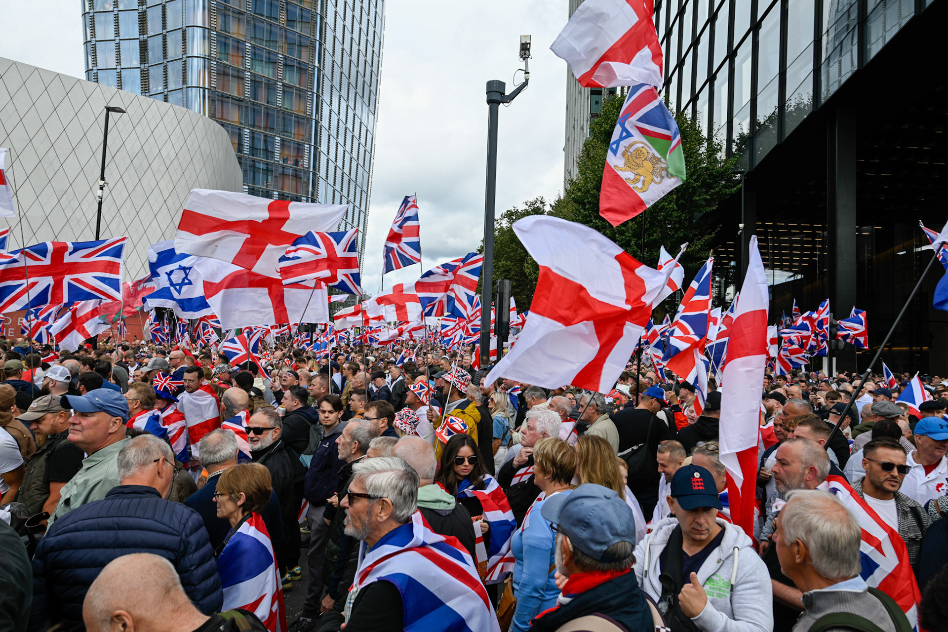 London, UK, 13th September: Approximately 100,000 supporters of Tommy Robinson march through central London,  monkeybutlerimages/alamy live news