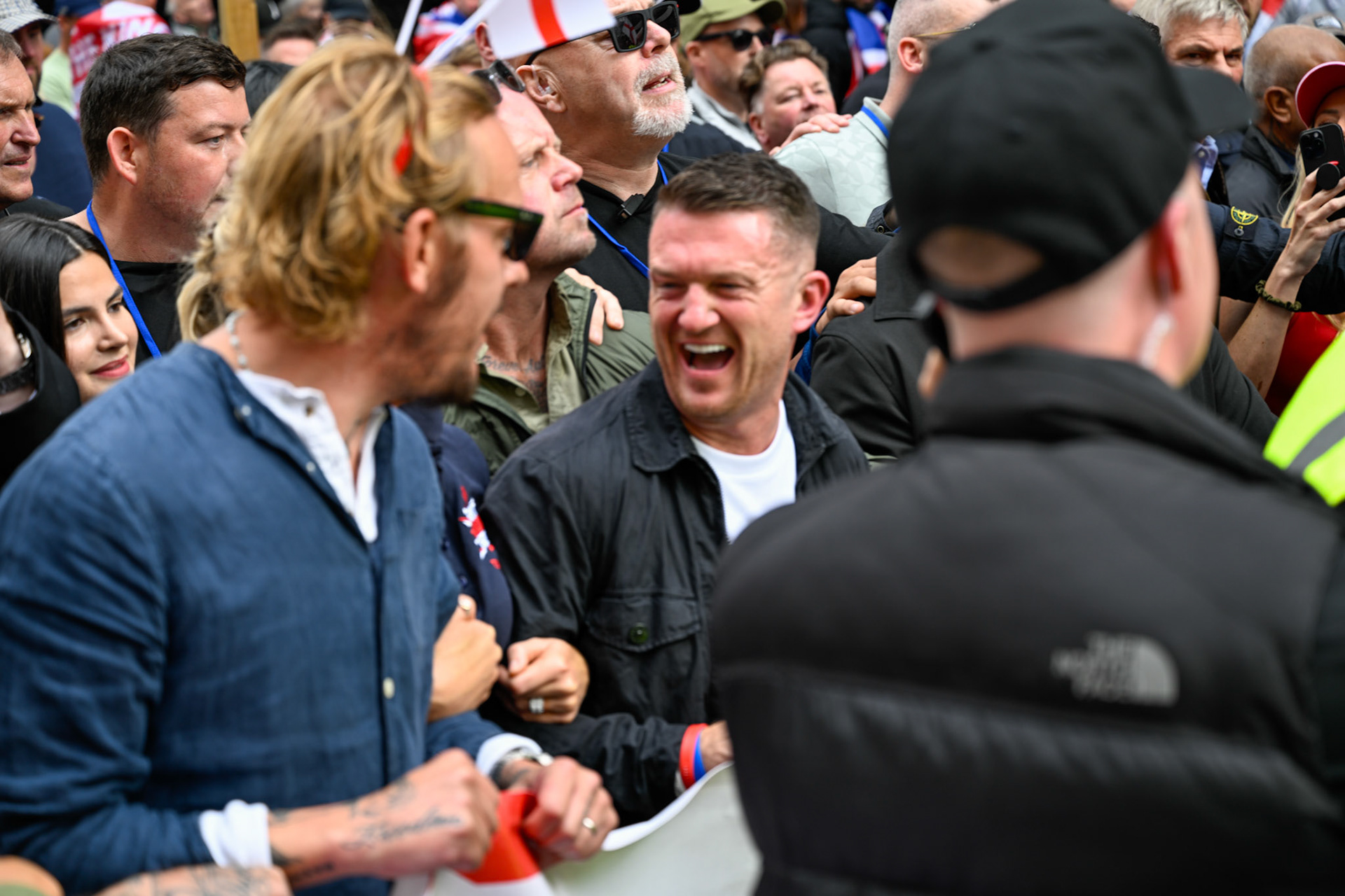 London, UK, 13th September: Approximately 100,000 supporters of Tommy Robinson march through central London,  monkeybutlerimages/alamy live news