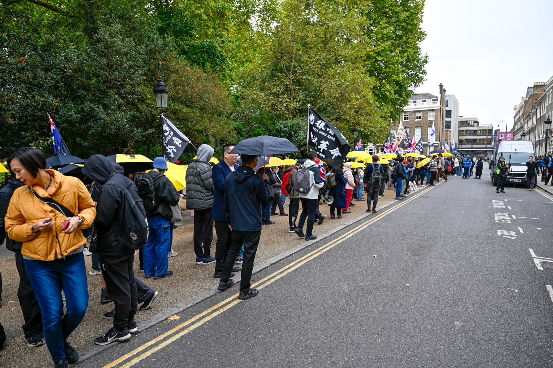 London, UK, 28th September 2025: 11th Anniversary march to commerate the pro democracy protest in Hong Kong in 2014 called the yellow umbrella revolution, monkeybutlerimages/ alamy live news