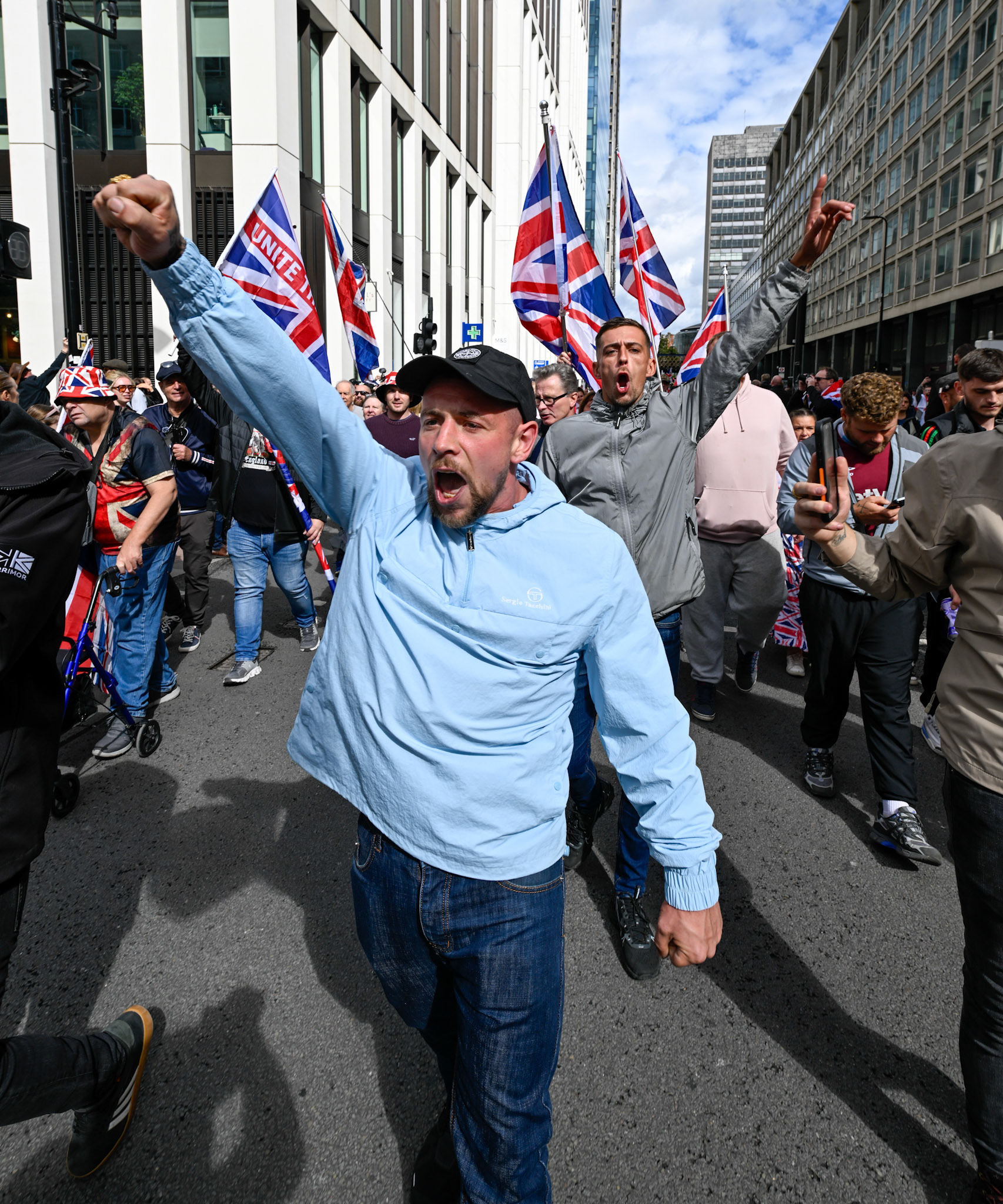 London, UK, 13th September: Approximately 100,000 supporters of Tommy Robinson march through central London,  monkeybutlerimages/alamy live news