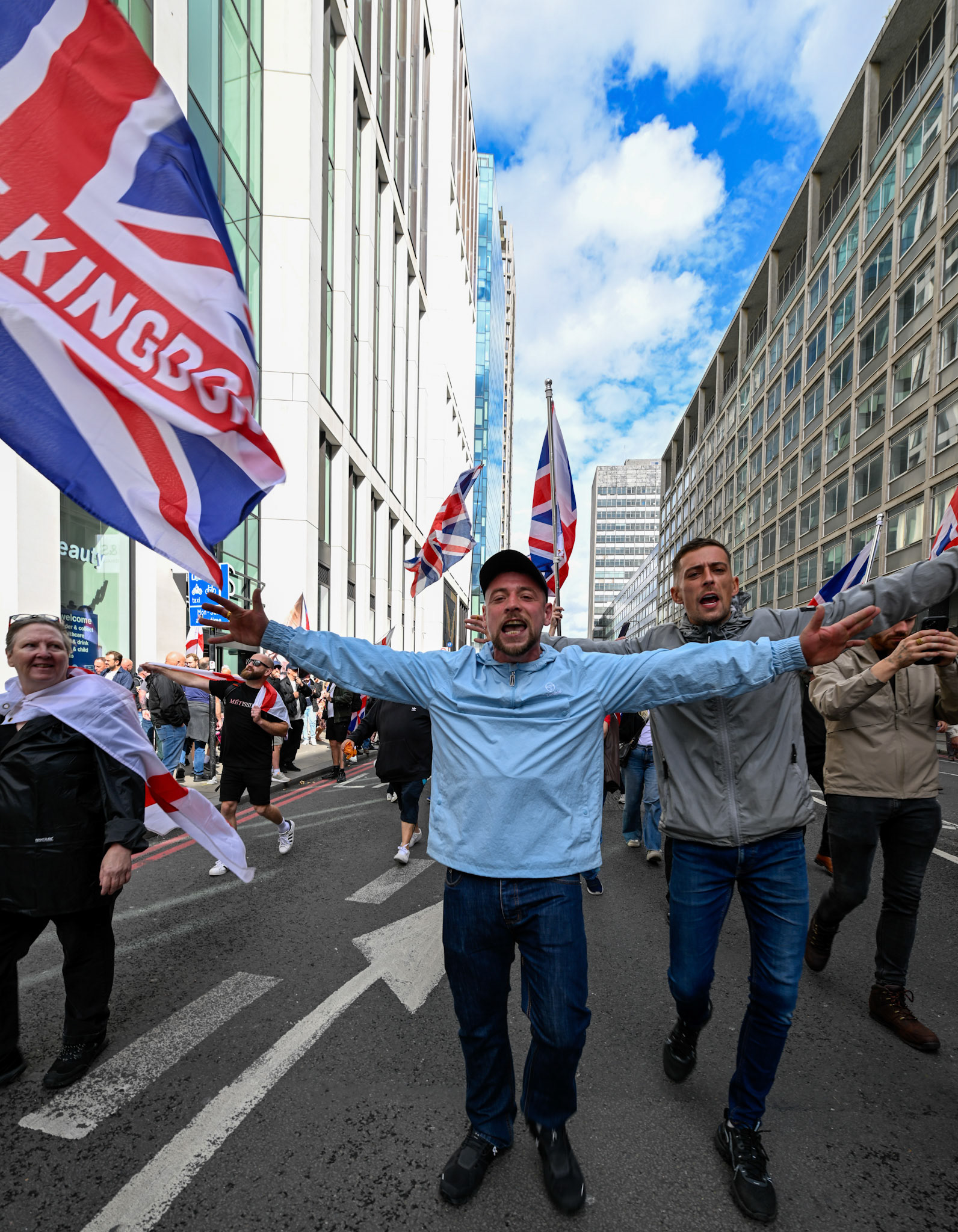 London, UK, 13th September: Approximately 100,000 supporters of Tommy Robinson march through central London,  monkeybutlerimages/alamy live news