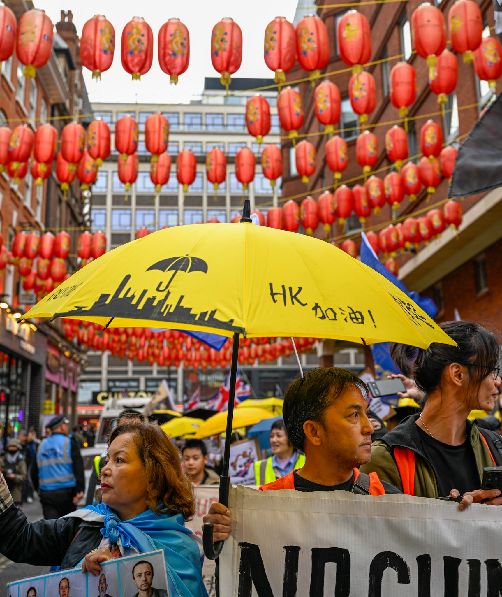 London, UK, 28th September 2025: 11th Anniversary march to commerate the pro democracy protest in Hong Kong in 2014 called the yellow umbrella revolution, monkeybutlerimages/ alamy live news