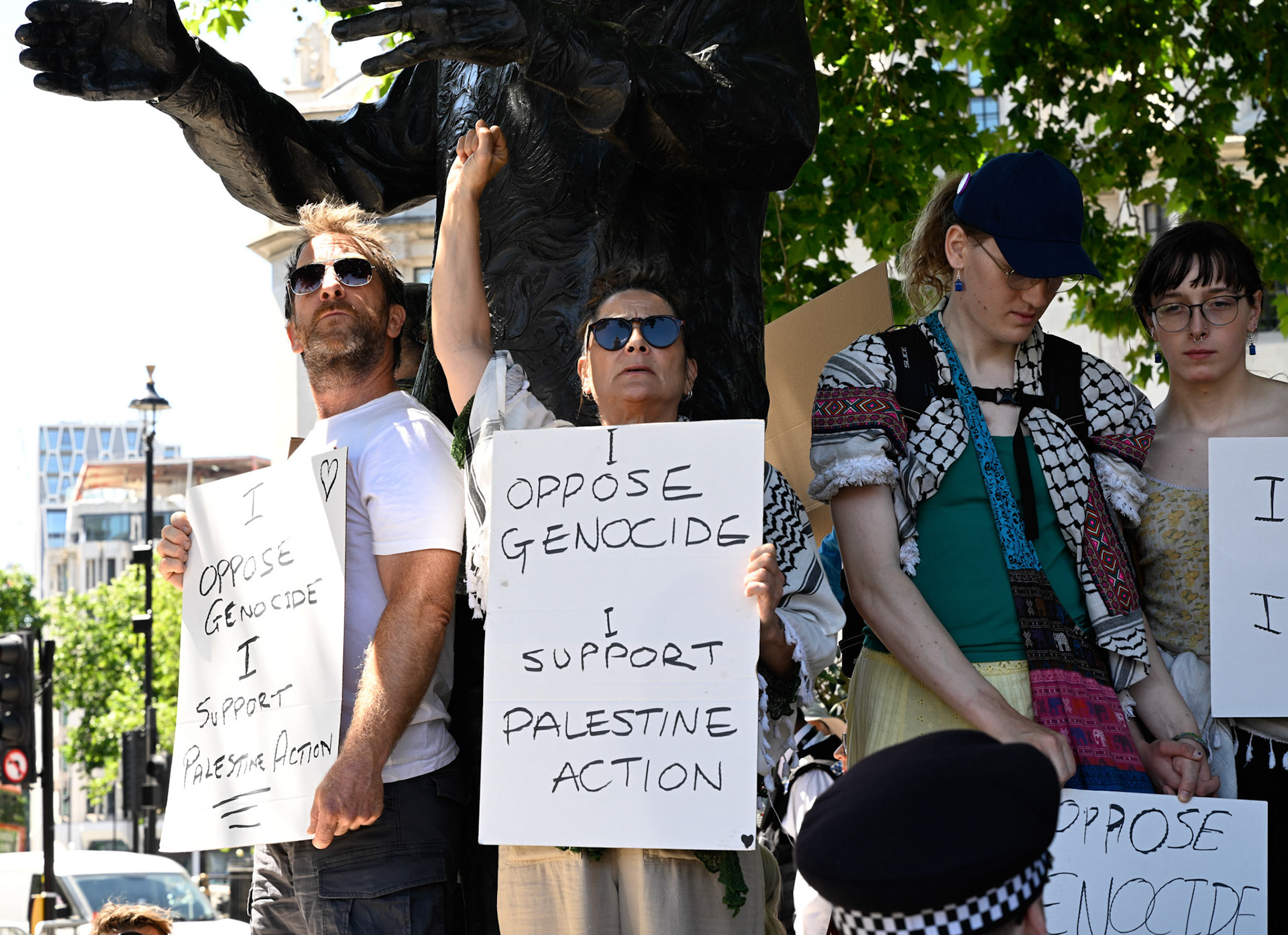 Palestine Action supporters protest at Parliament Square opposite The Houses of Parliament. The group were all arrested.