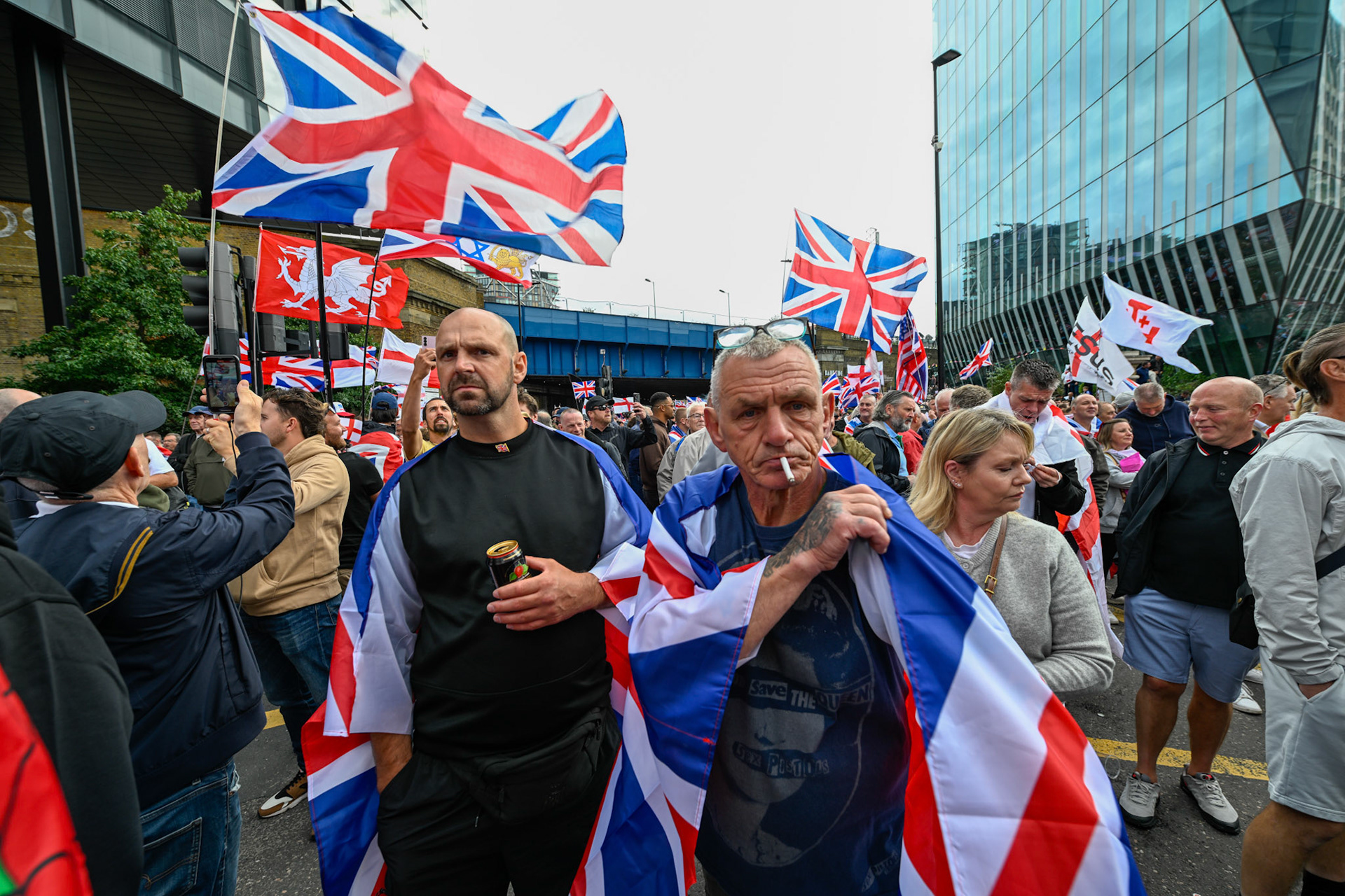 London, UK, 13th September: Approximately 100,000 supporters of Tommy Robinson march through central London,  monkeybutlerimages/alamy live news