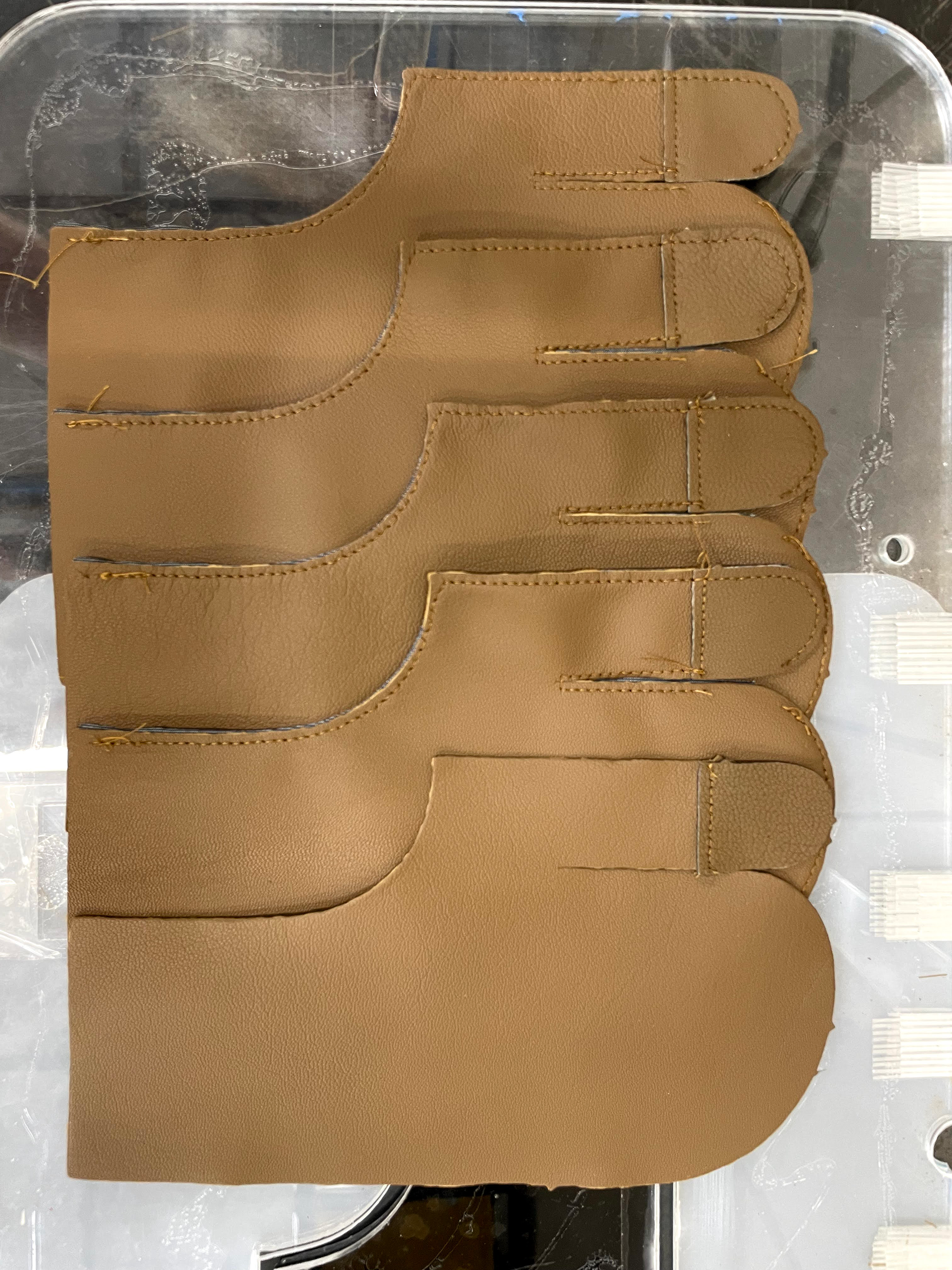 Goat Leather, Waterproof Pocket Liner, and Touch Tec Leather joined using a custom CNC sewing jig.